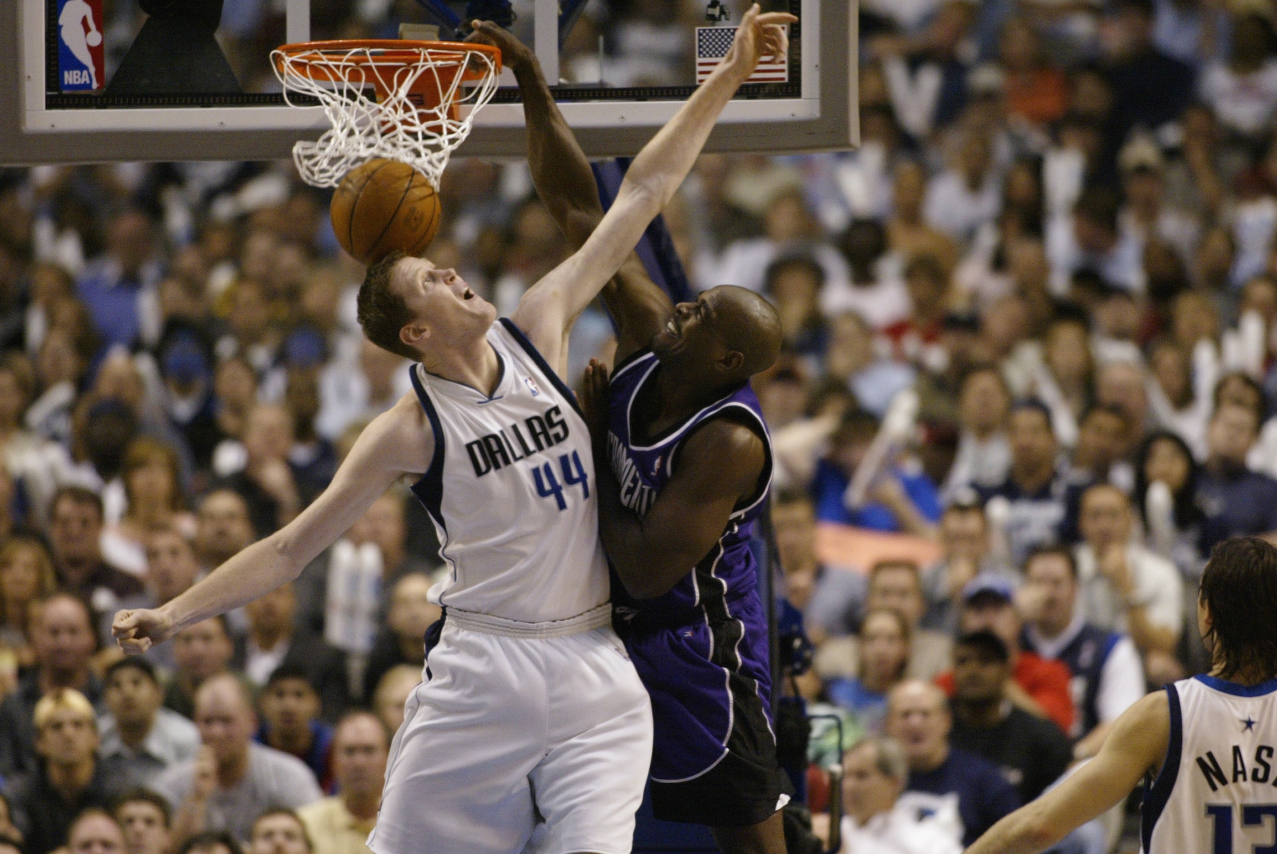 DALLAS - MAY 6:  Chris Webber #4 of the Sacramento Kings dunks on Shawn Bradley #44 of the Dallas Mavericks in Game one of the Western Conference Semifinals during the 2003 NBA Playoffs at American Airlines Center on May 6, 2003 in Dallas, Texas.  The Kin