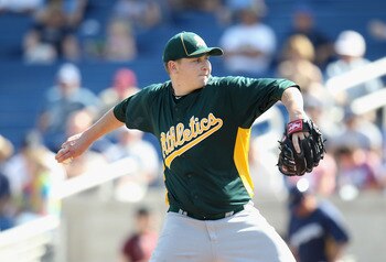 PHOENIX, AZ - MARCH 03:  Starting pitcher Trevor Cahill #53 of the Oakland Athletics pitches against the Milwaukee Brewers during the spring training game at Maryvale Baseball Park on March 3, 2011 in Phoenix, Arizona.  (Photo by Christian Petersen/Getty