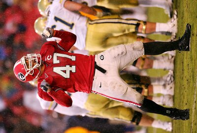 ATHENS, GA - NOVEMBER 27:  David Pollack #47, of the Georgia Bulldogs shouts to the crowd during their game against Georgia Tech on November 27, 2004 at Sanford Stadium in Athens, Georgia.  (Photo by Scott Halleran/Getty Images)