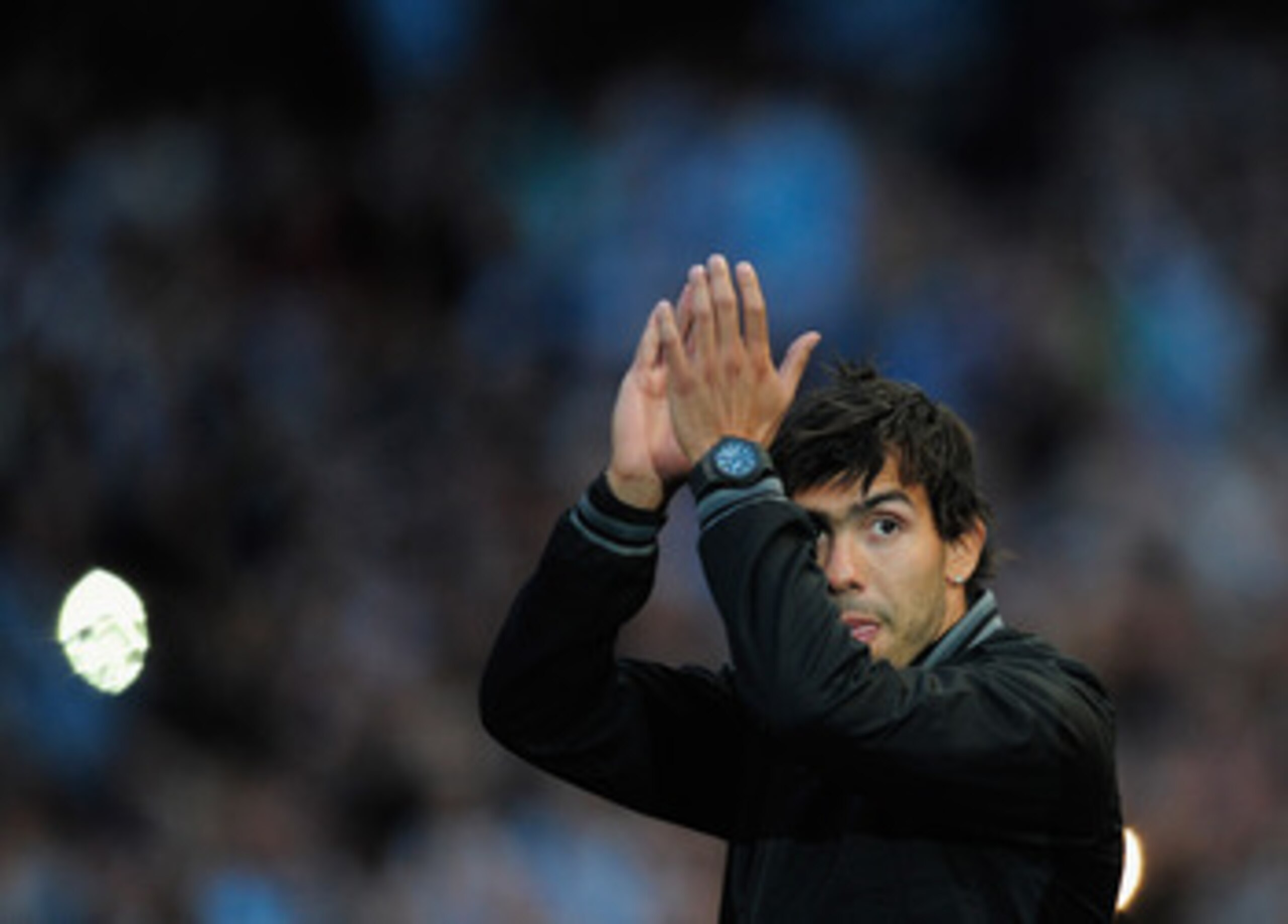 MANCHESTER, ENGLAND - MAY 23: Carlos Tevez of Manchester City waves to the fans during the Manchester City FA Cup Winners Parade at the City of Manchester stadium on May 23, 2011 in Manchester, United Kingdom. (Photo by Jamie McDonald/Getty Images) MANCHESTER, ENGLAND - MAY 23: Carlos Tevez of Manchester City waves to the fans during the Manchester City FA Cup Winners Parade at the City of Manchester stadium on May 23, 2011 in Manchester, United Kingdom. (Photo by Jamie McDonald/Getty Images)