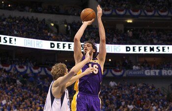 DALLAS, TX - MAY 06:  Forward Pau Gasol #16 of the Los Angeles Lakers takes a shot against Dirk Nowitzki #41 of the Dallas Mavericks in Game Three of the Western Conference Semifinals during the 2011 NBA Playoffs on May 6, 2011 at American Airlines Center