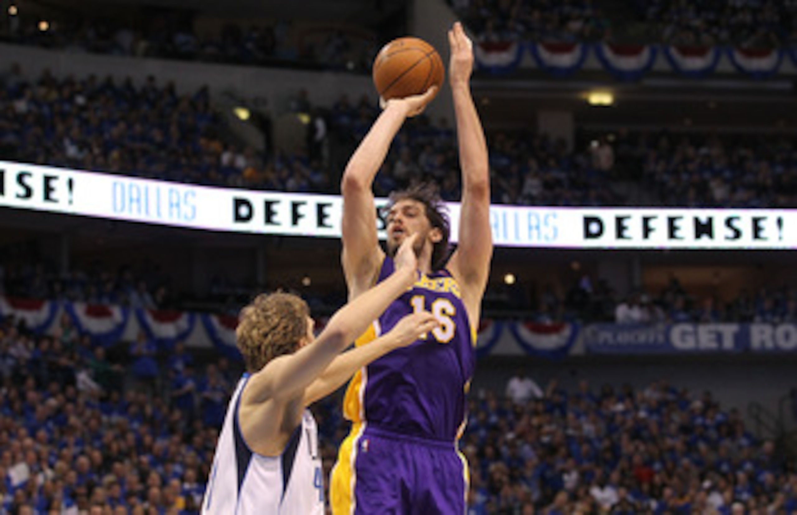 DALLAS, TX - MAY 06:  Forward Pau Gasol #16 of the Los Angeles Lakers takes a shot against Dirk Nowitzki #41 of the Dallas Mavericks in Game Three of the Western Conference Semifinals during the 2011 NBA Playoffs on May 6, 2011 at American Airlines Center