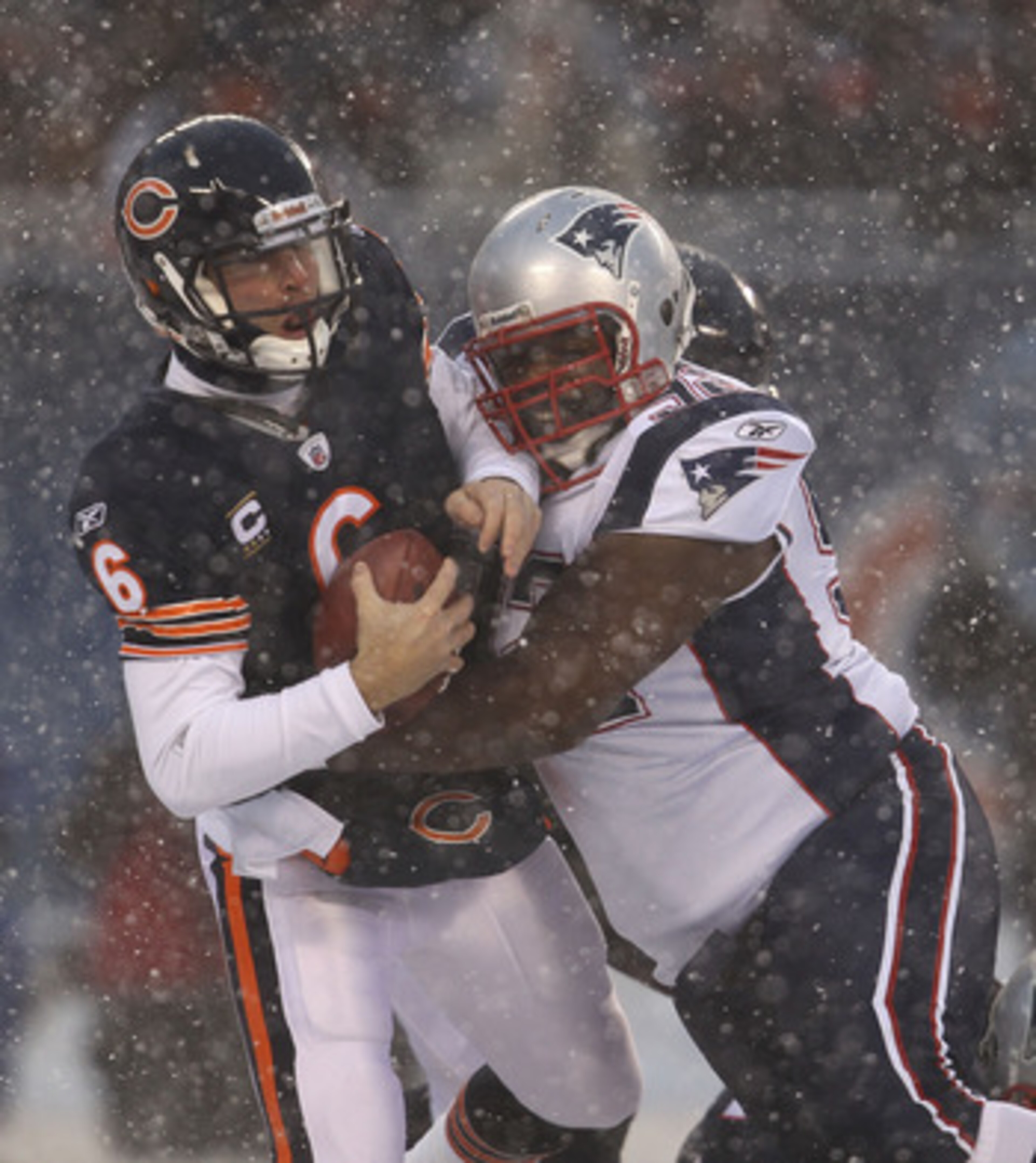 CHICAGO, IL - DECEMBER 12: Jay Cutler #6 of the Chicago Bears is sacked by Gerard Warren #92 of the New England Patriots at Soldier Field on December 12, 2010 in Chicago, Illinois. The Patriots defeated the Bears 36-7. (Photo by Jonathan Daniel/Getty Ima CHICAGO, IL - DECEMBER 12: Jay Cutler #6 of the Chicago Bears is sacked by Gerard Warren #92 of the New England Patriots at Soldier Field on December 12, 2010 in Chicago, Illinois. The Patriots defeated the Bears 36-7. (Photo by Jonathan Daniel/Getty Ima
