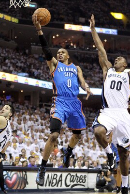 MEMPHIS, TN - MAY 09:  Russell Westbrook #0 of the Oklahoma City Thunder shoots the ball while defended by Darrell Arthur #00 of the Memphis Grizzlies in Game Four of the Western Conference Semifinals in the 2011 NBA Playoffs at FedExForum on May 9, 2011