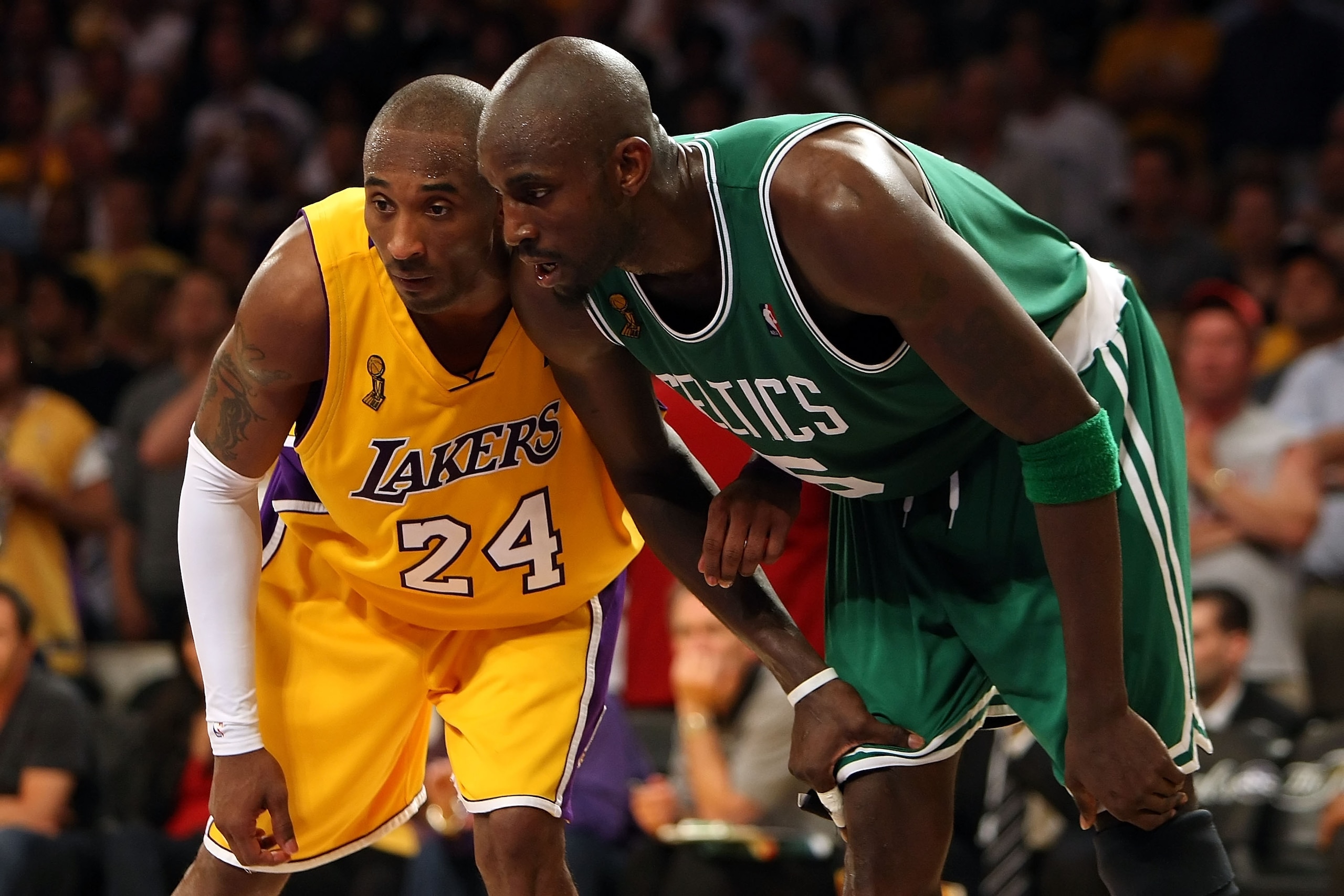 LOS ANGELES, CA - JUNE 10: Kobe Bryant #24 of the Los Angeles Lakers puts his arm on Kevin Garnett #5 of the Boston Celtics in Game Three of the 2008 NBA Finals on June 10, 2008 at Staples Center in Los Angeles, California. NOTE TO USER: User expressly a LOS ANGELES, CA - JUNE 10: Kobe Bryant #24 of the Los Angeles Lakers puts his arm on Kevin Garnett #5 of the Boston Celtics in Game Three of the 2008 NBA Finals on June 10, 2008 at Staples Center in Los Angeles, California. NOTE TO USER: User expressly a