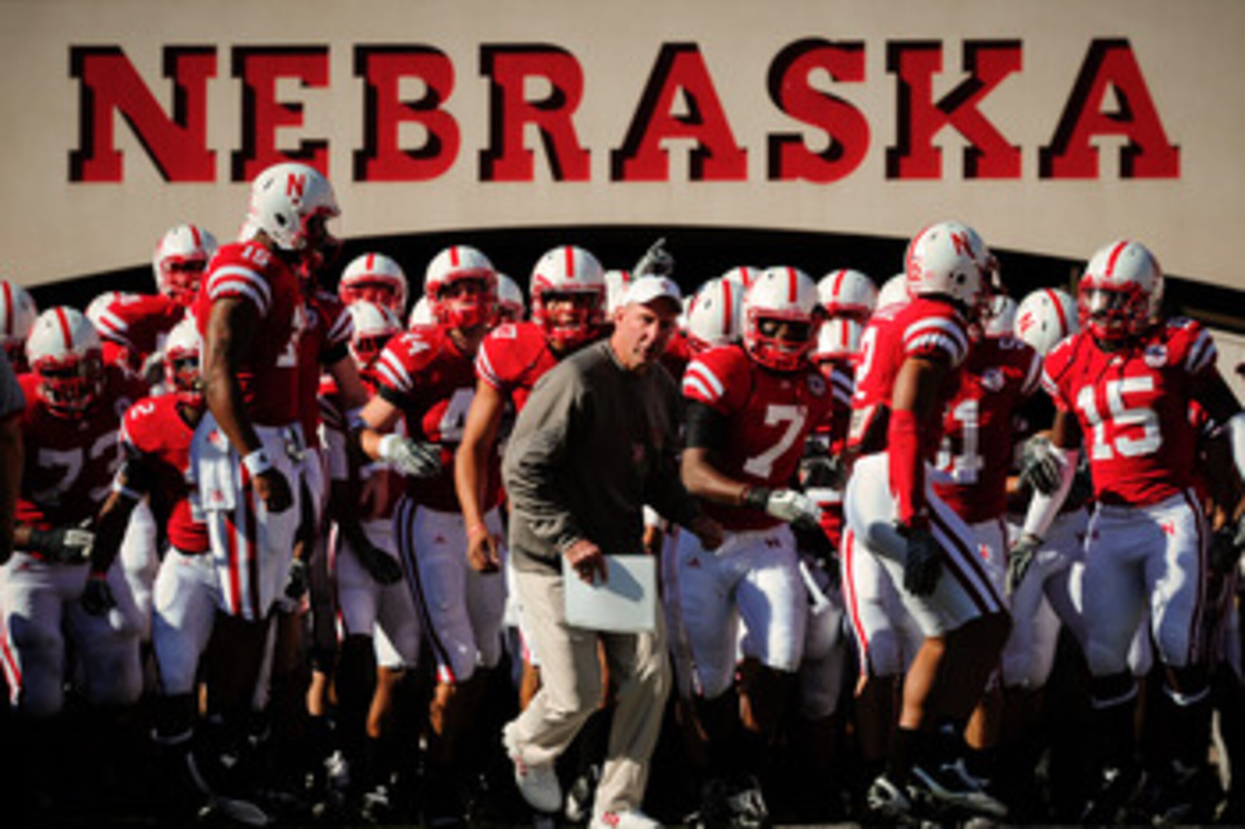 LINCOLN, NE - OCTOBER 30: Coach Bo Pelini  leads his Nebraska Cornhusker football team on the field against the Missouri Tigers at Memorial Stadium on October 30, 2010 in Lincoln, Nebraska. Nebraska Defeated Missouri 31-17. (Photo by Eric Francis/Getty Im