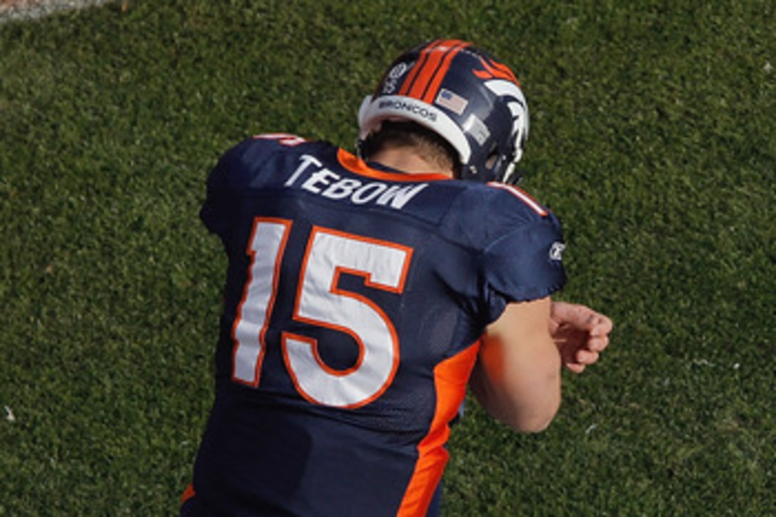 DENVER - DECEMBER 26:  Tim Tebow #15 of the Denver Broncos prays in the end zone prior to taking on the Houston Texans at INVESCO Field at Mile High on December 26, 2010 in Denver, Colorado. (Photo by Justin Edmonds/Getty Images)