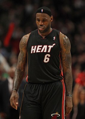 CHICAGO, IL - FEBRUARY 24: LeBron James #6 of the Miami Heat walks off of the court after a loss to the Chicago Bulls at the United Center on February 24, 2011 in Chicago, Illinois. The Bulls defeated the Heat 93-89. NOTE TO USER: User expressly acknowled
