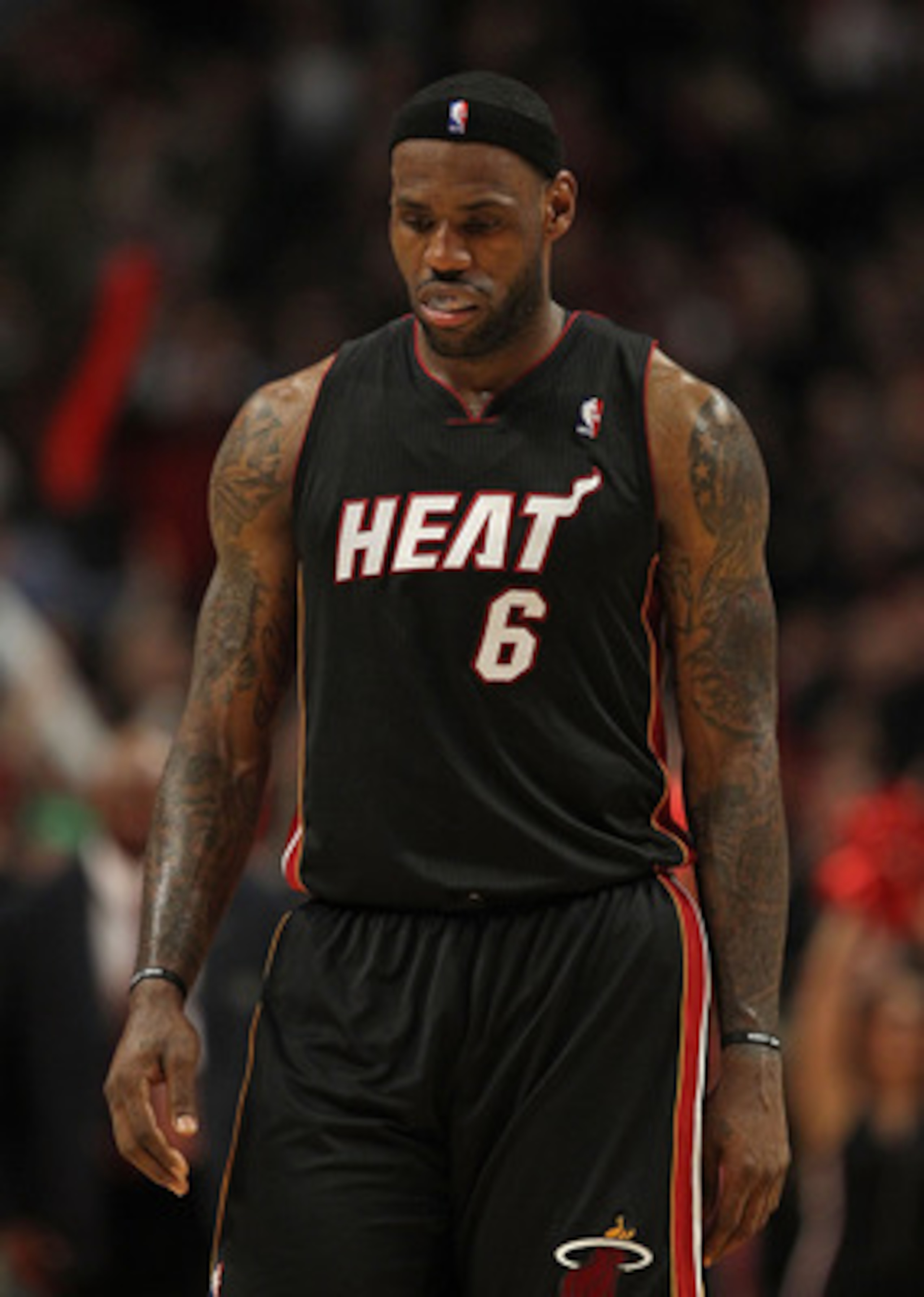 CHICAGO, IL - FEBRUARY 24: LeBron James #6 of the Miami Heat walks off of the court after a loss to the Chicago Bulls at the United Center on February 24, 2011 in Chicago, Illinois. The Bulls defeated the Heat 93-89. NOTE TO USER: User expressly acknowled