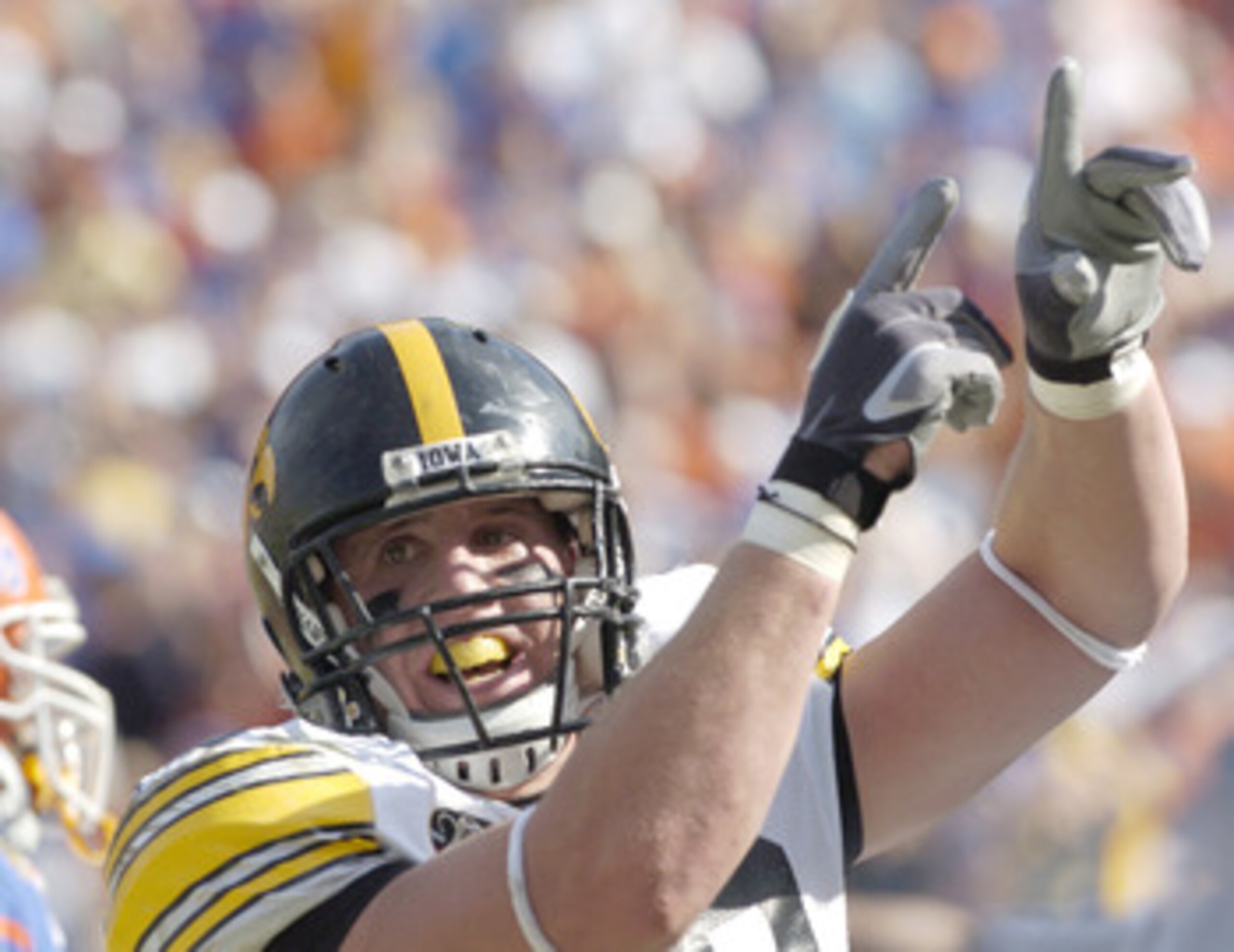 Iowa linebacker Chad Greenway celebrates a defensive stop against Florida in the 2006 Outback Bowl January 2 in Tampa.  Florida defeated Iowa 31 - 24. (Photo by A. Messerschmidt/Getty Images) *** Local Caption ***