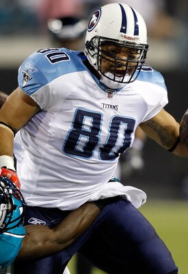 JACKSONVILLE, FL - OCTOBER 18:  Safety Gerald Alexander #42 of the Jacksonville Jaguars tries to stop tight end Bo Scaife #80 of the Tennessee Titans during the game at EverBank Field on October 18, 2010 in Jacksonville, Florida.  (Photo by J. Meric/Getty