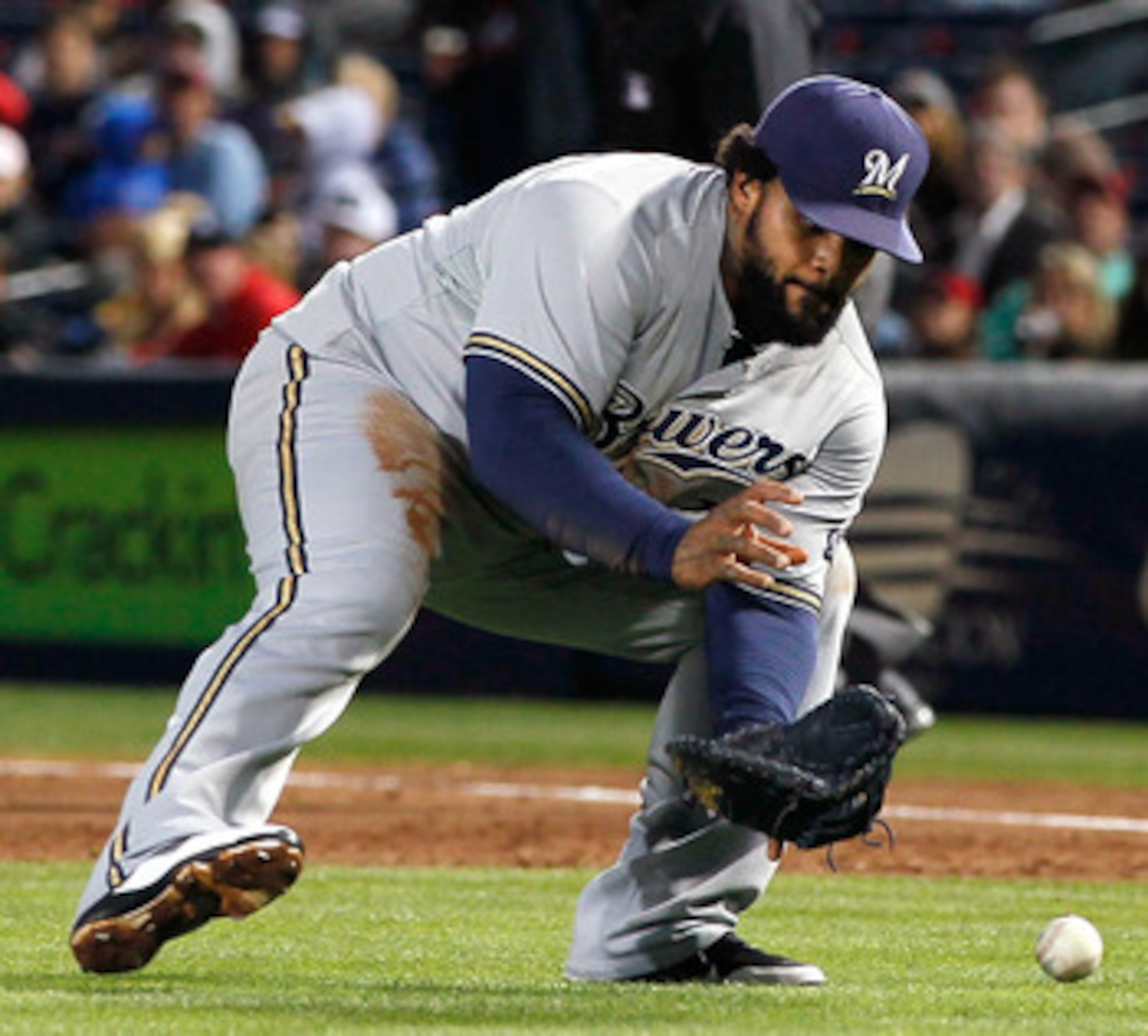 ATLANTA, GA - MAY 04:  Prince Fielder #28 of the Milwaukee Brewers fields a bunt by Tim Hudson #15 of the Atlanta Braves in the second inning at Turner Field on May 4, 2011 in Atlanta, Georgia.  (Photo by Kevin C. Cox/Getty Images)