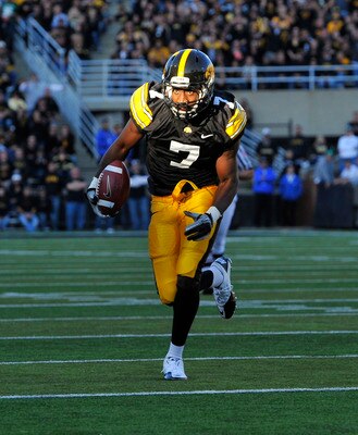 IOWA CITY, IA - OCTOBER 30- Wide receiver Marvin McNutt #7 of the University of Iowa Hawkeyes drives the ball into the end zone for a touch down during the second half of play against the Michigan State Spartans at Kinnick Stadium on October 30, 2010 in I