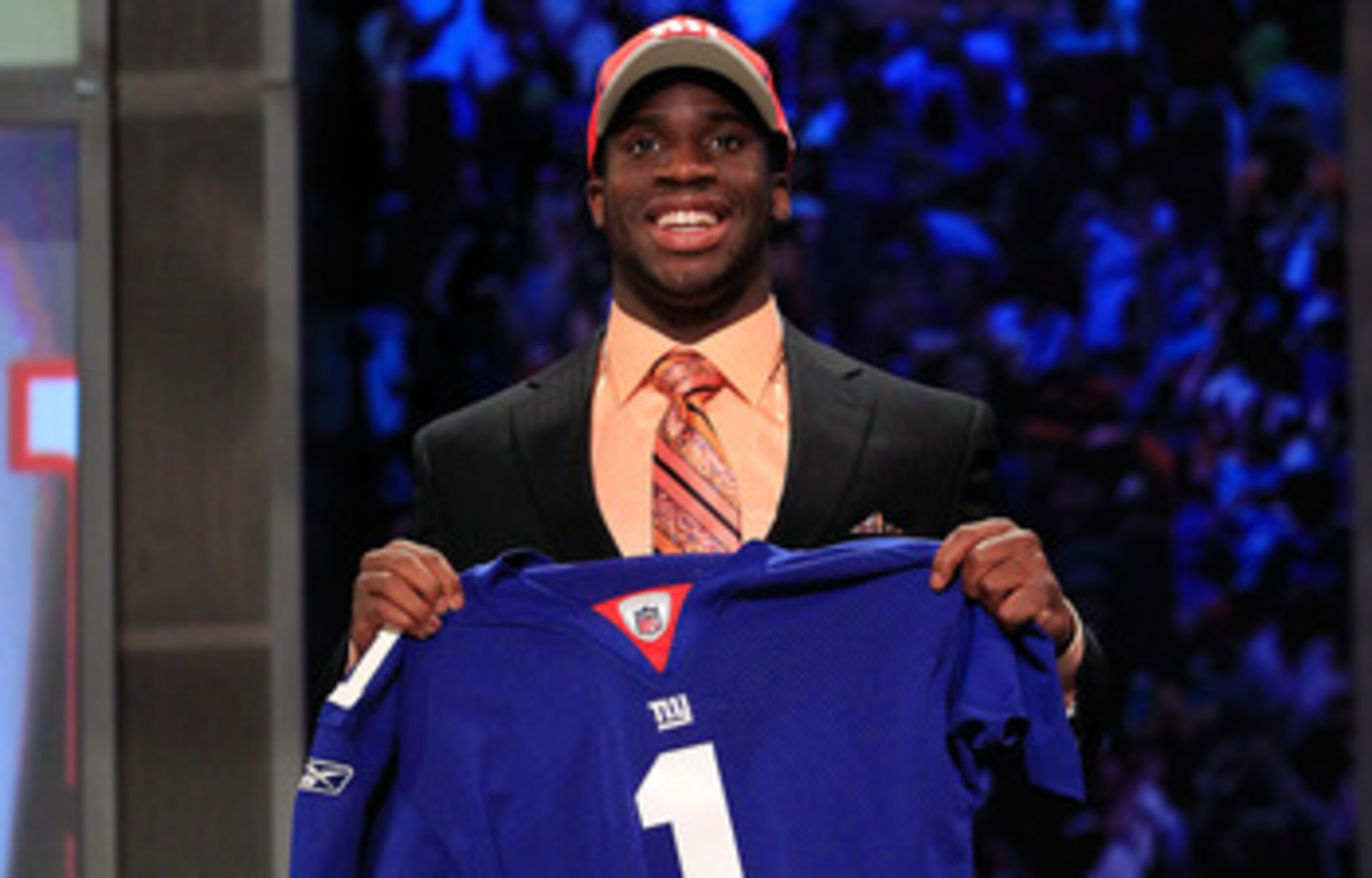 NEW YORK, NY - APRIL 28:  Prince Amukamara, #19 overall pick by the New York Giants, holds up a jersey on stage during the 2011 NFL Draft at Radio City Music Hall on April 28, 2011 in New York City.  (Photo by Chris Trotman/Getty Images)