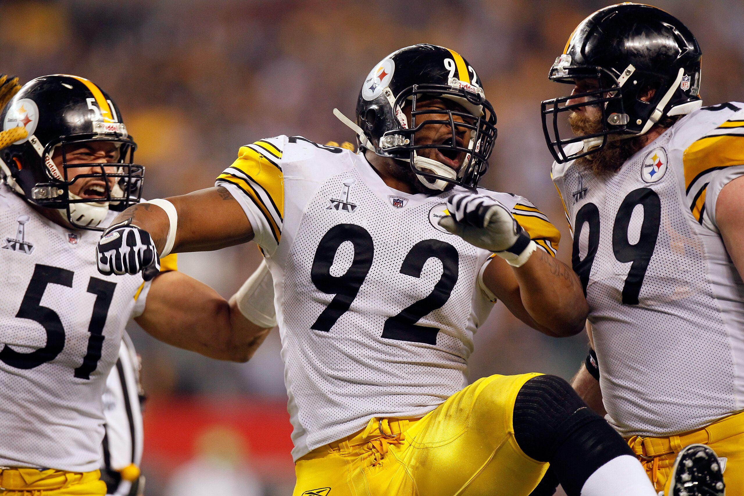 ARLINGTON, TX - FEBRUARY 06: James Farrior #51, James Harrison #92 and Brett Keisel #99 of the Pittsburgh Steelers celebrate a defensive play against the Green Bay Packers during Super Bowl XLV at Cowboys Stadium on February 6, 2011 in Arlington, Texas. ARLINGTON, TX - FEBRUARY 06: James Farrior #51, James Harrison #92 and Brett Keisel #99 of the Pittsburgh Steelers celebrate a defensive play against the Green Bay Packers during Super Bowl XLV at Cowboys Stadium on February 6, 2011 in Arlington, Texas.