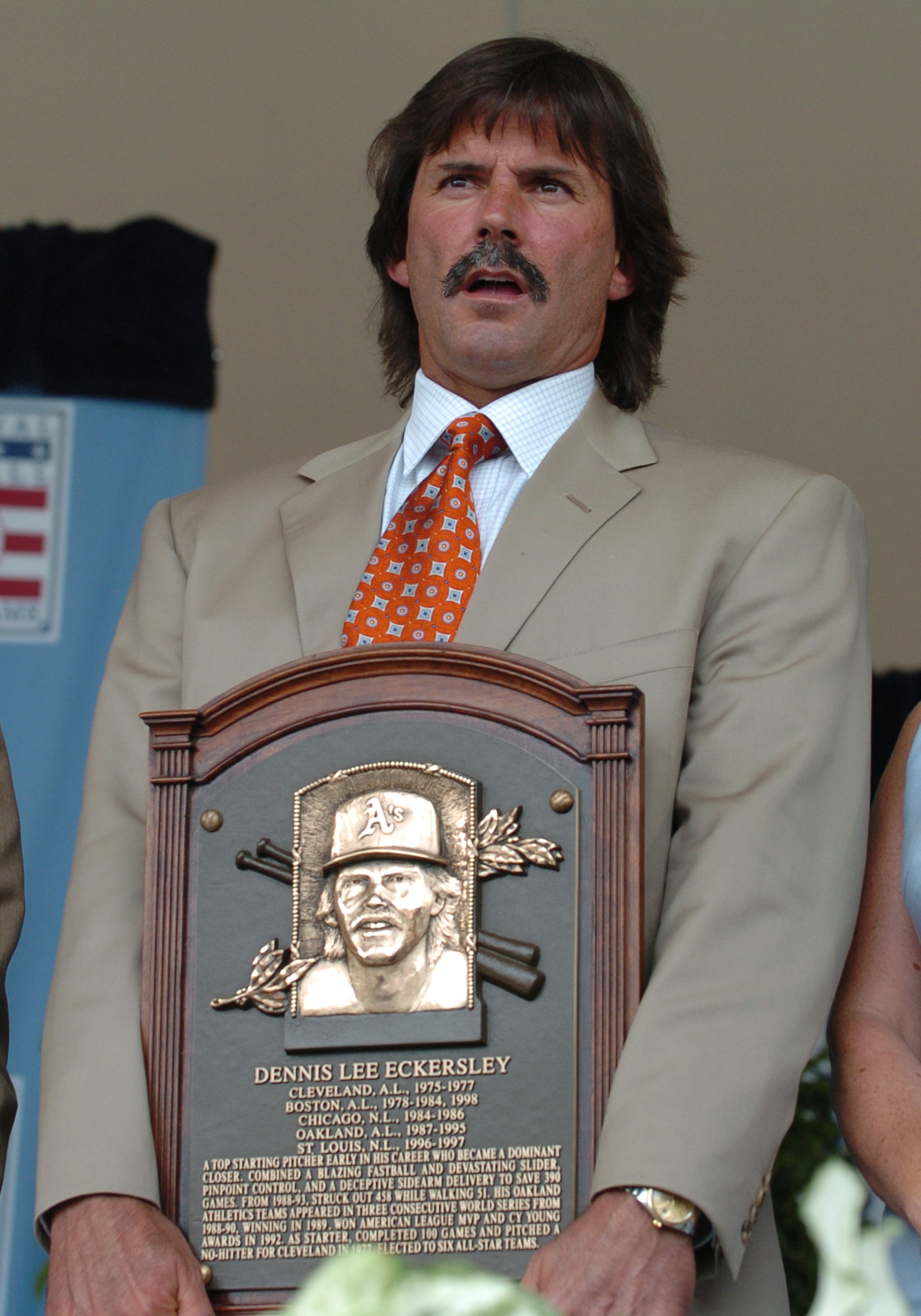 Pitcher Dennis Eckersley poses with his plaque at  2004  Baseball Hall of Fame induction ceremonies  July 25, 2004 in Cooperstown, New York. (Photo by A. Messerschmidt/Getty Images) *** Local Caption ***