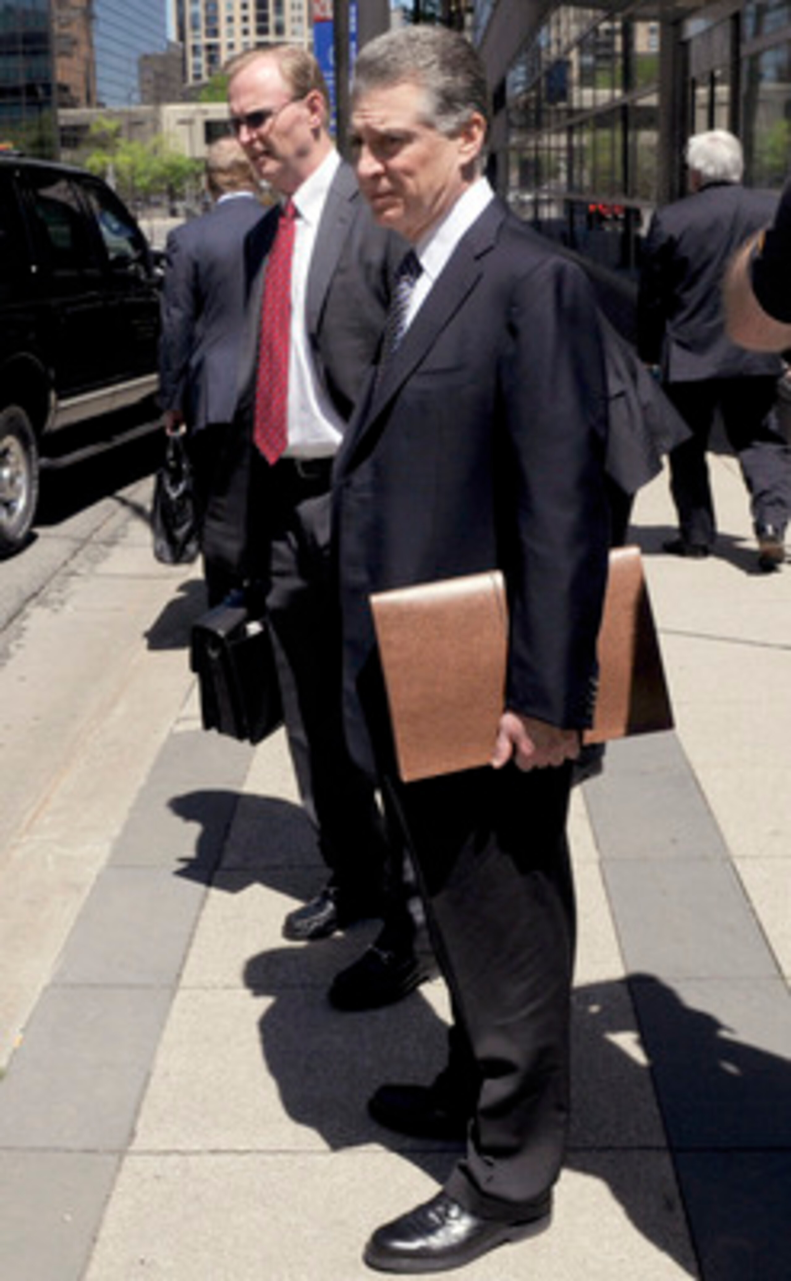 MINNEAPOLIS, MN - MAY 17: NFL owner John Mara (L) of the New York Giants and Art Rooney II, president of the Pittsburgh Steelers leaves court ordered mediation at the U.S. Courthouse on May 17, 2011 in Minneapolis, Minnesota. As the NFL lockout remains in