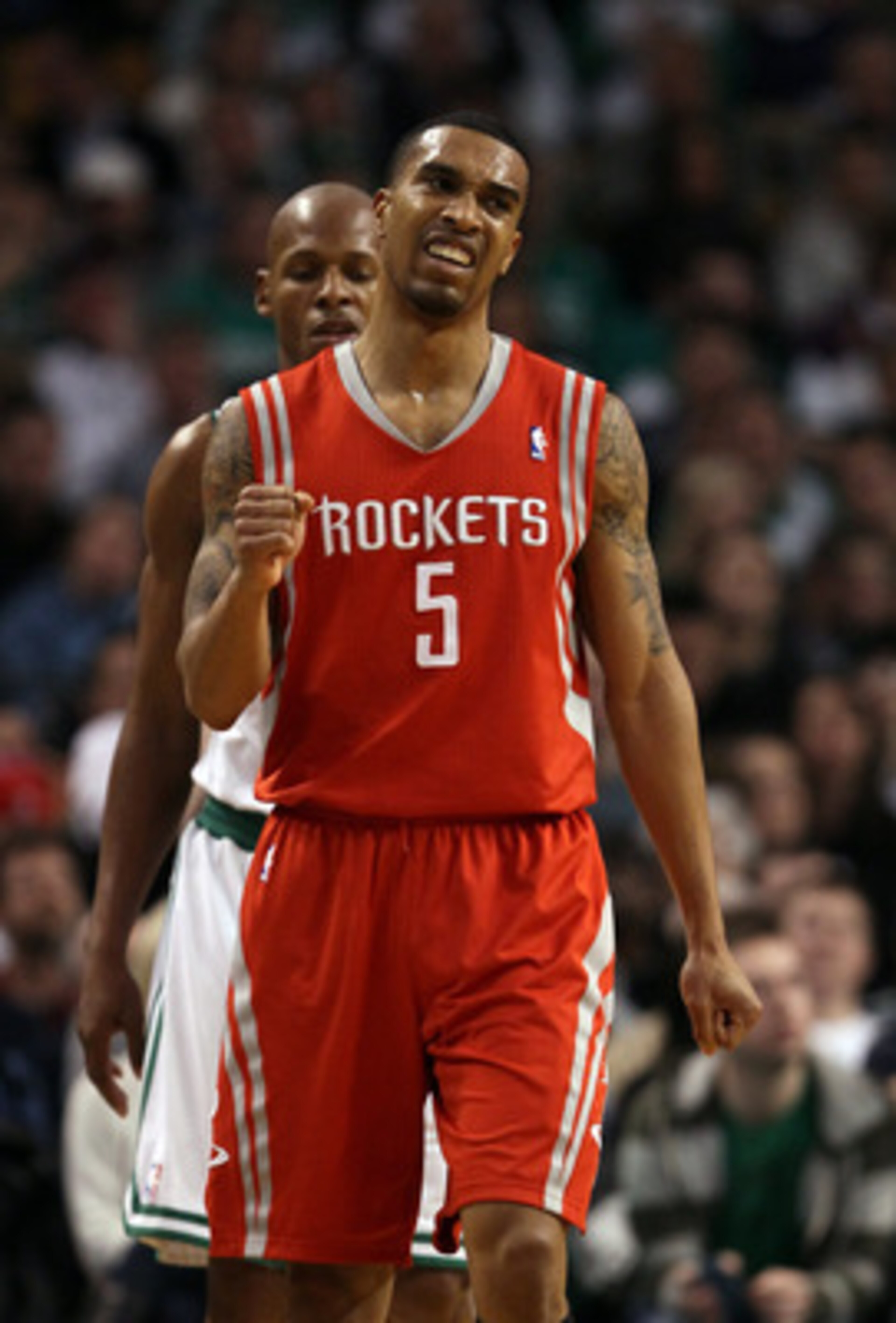 BOSTON, MA - JANUARY 10: Courtney Lee #5 of the Houston Rockets celebrates a shot against the Boston Celtics on January 10, 2011 at the TD Garden in Boston, Massachusetts. The Rockets defeated the Celtics 108-102. NOTE TO USER: User expressly acknowledg BOSTON, MA - JANUARY 10: Courtney Lee #5 of the Houston Rockets celebrates a shot against the Boston Celtics on January 10, 2011 at the TD Garden in Boston, Massachusetts. The Rockets defeated the Celtics 108-102. NOTE TO USER: User expressly acknowledg