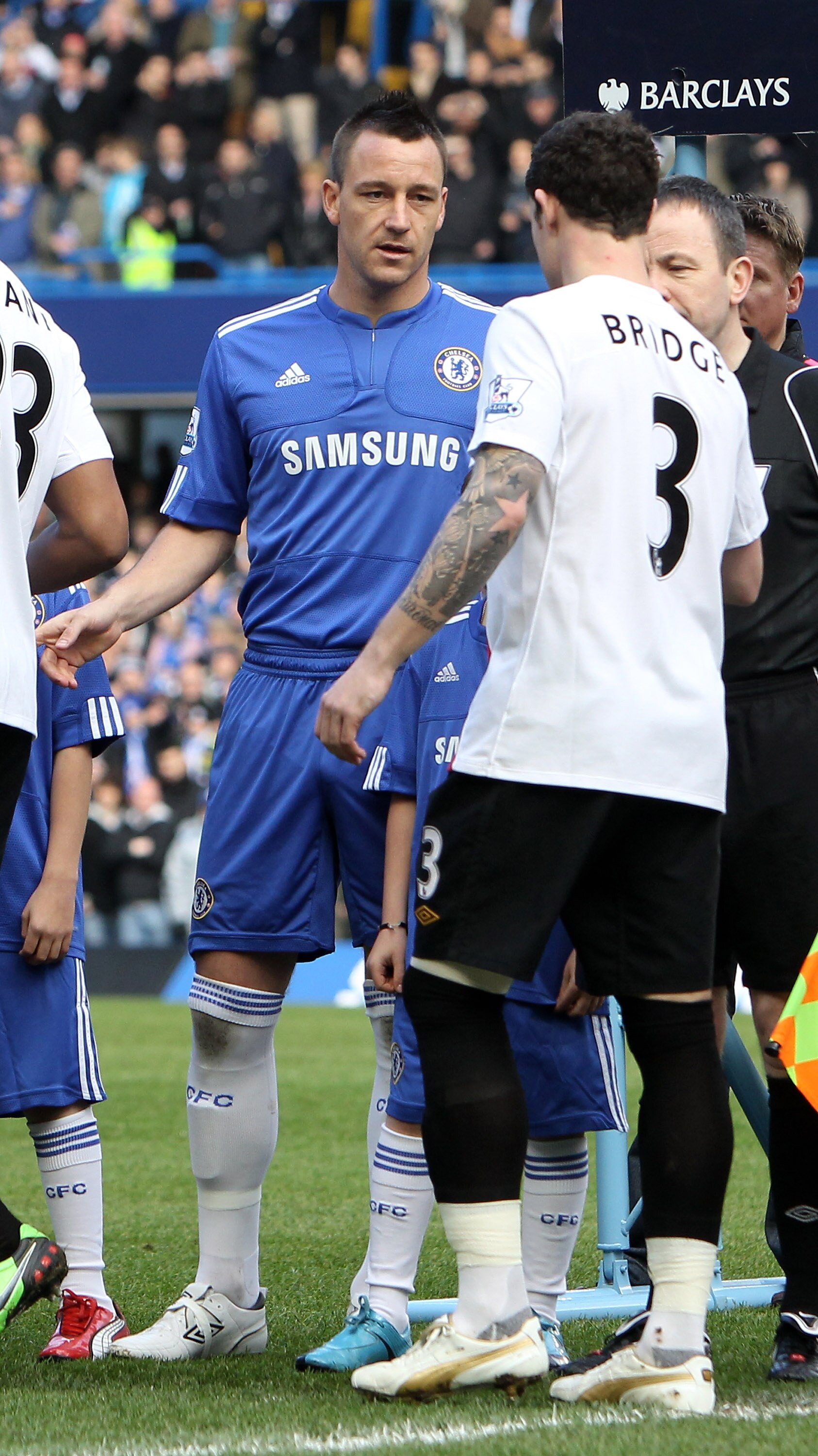 LONDON, ENGLAND - FEBRUARY 27:  John Terry of Chelsea and Wayne Bridge of Manchester City walk past each other prior to the Barclays Premier League match between Chelsea and Manchester City at Stamford Bridge on February 27, 2010 in London, England.  (Pho