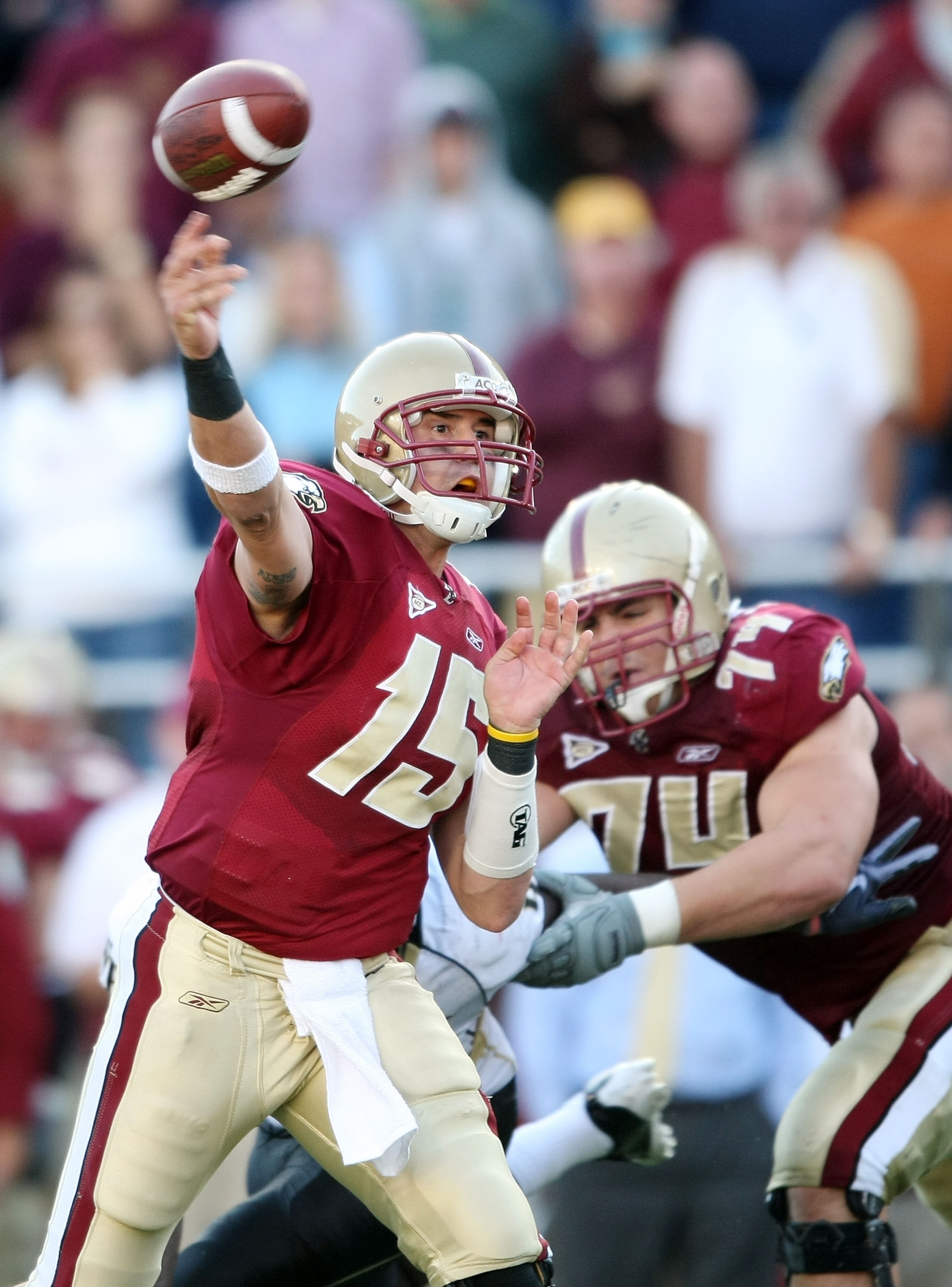 CHESTNUT HILL, MA - SEPTEMBER 26:  Dave Shinskie #15 of the Boston College Eagles passes the ball in overtime as teammate Anthony Castonzo #74 blocks against the Wake Forest Demon Deacons on September 26, 2009 at Alumni Stadium in Chestnut Hill, Massachus