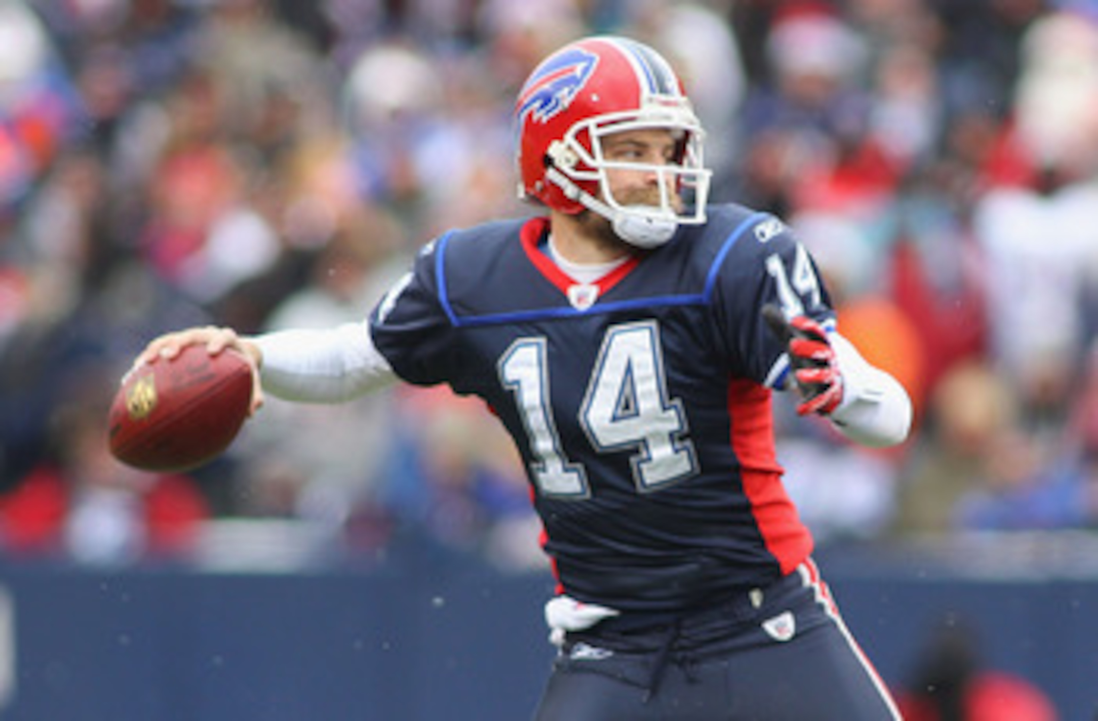 ORCHARD PARK, NY - DECEMBER 26:  Ryan Fitzpatrick #14 of the Buffalo Bills readies to pass against the New England Patriots at Ralph Wilson Stadium on December 26, 2010 in Orchard Park, New York.  (Photo by Rick Stewart/Getty Images)