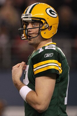 ARLINGTON, TX - FEBRUARY 06:  Aaron Rodgers #12 of the Green Bay Packers looks on while the Packers take on the Pittsburgh Steelers during Super Bowl XLV at Cowboys Stadium on February 6, 2011 in Arlington, Texas.  (Photo by Doug Pensinger/Getty Images)