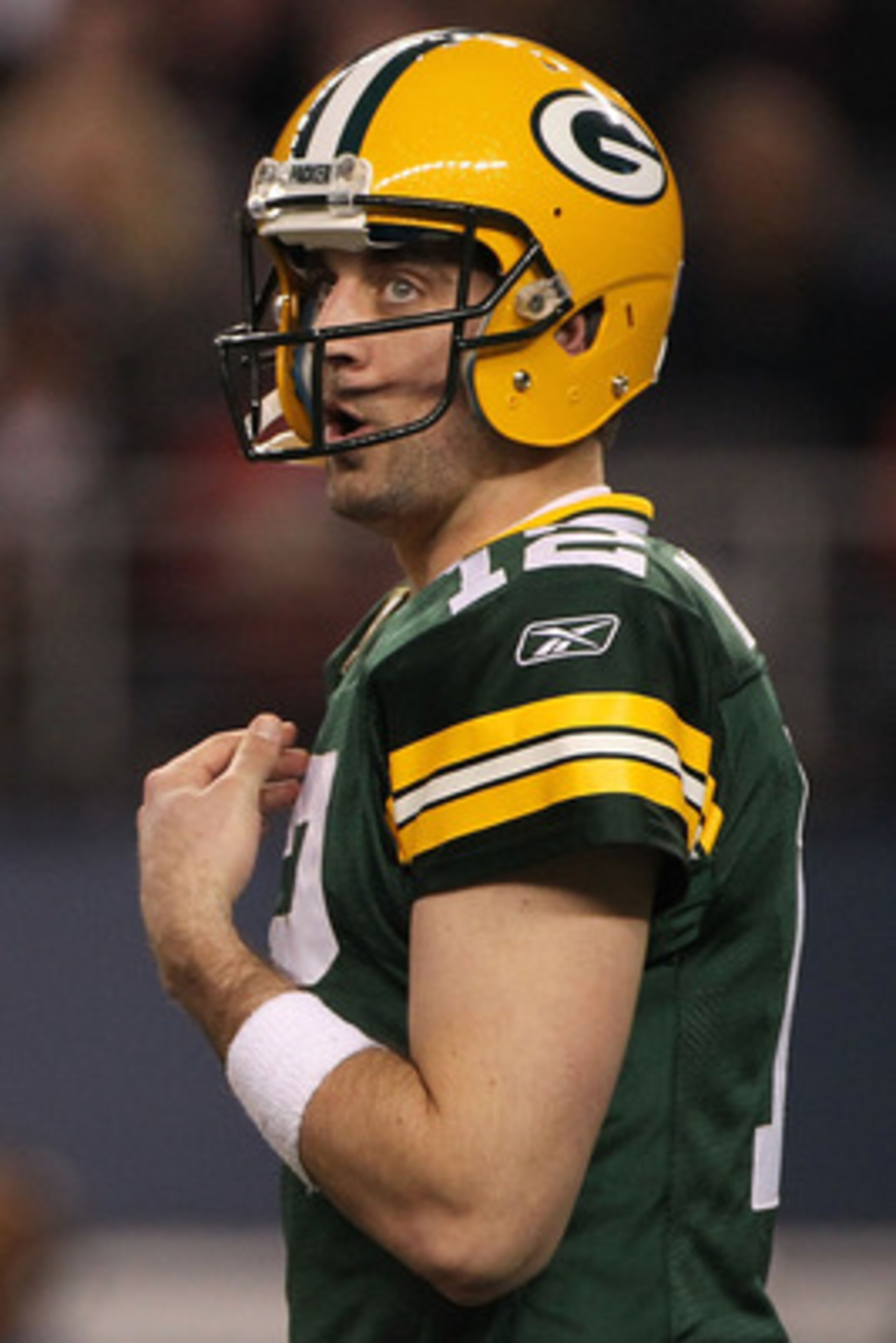 ARLINGTON, TX - FEBRUARY 06:  Aaron Rodgers #12 of the Green Bay Packers looks on while the Packers take on the Pittsburgh Steelers during Super Bowl XLV at Cowboys Stadium on February 6, 2011 in Arlington, Texas.  (Photo by Doug Pensinger/Getty Images)