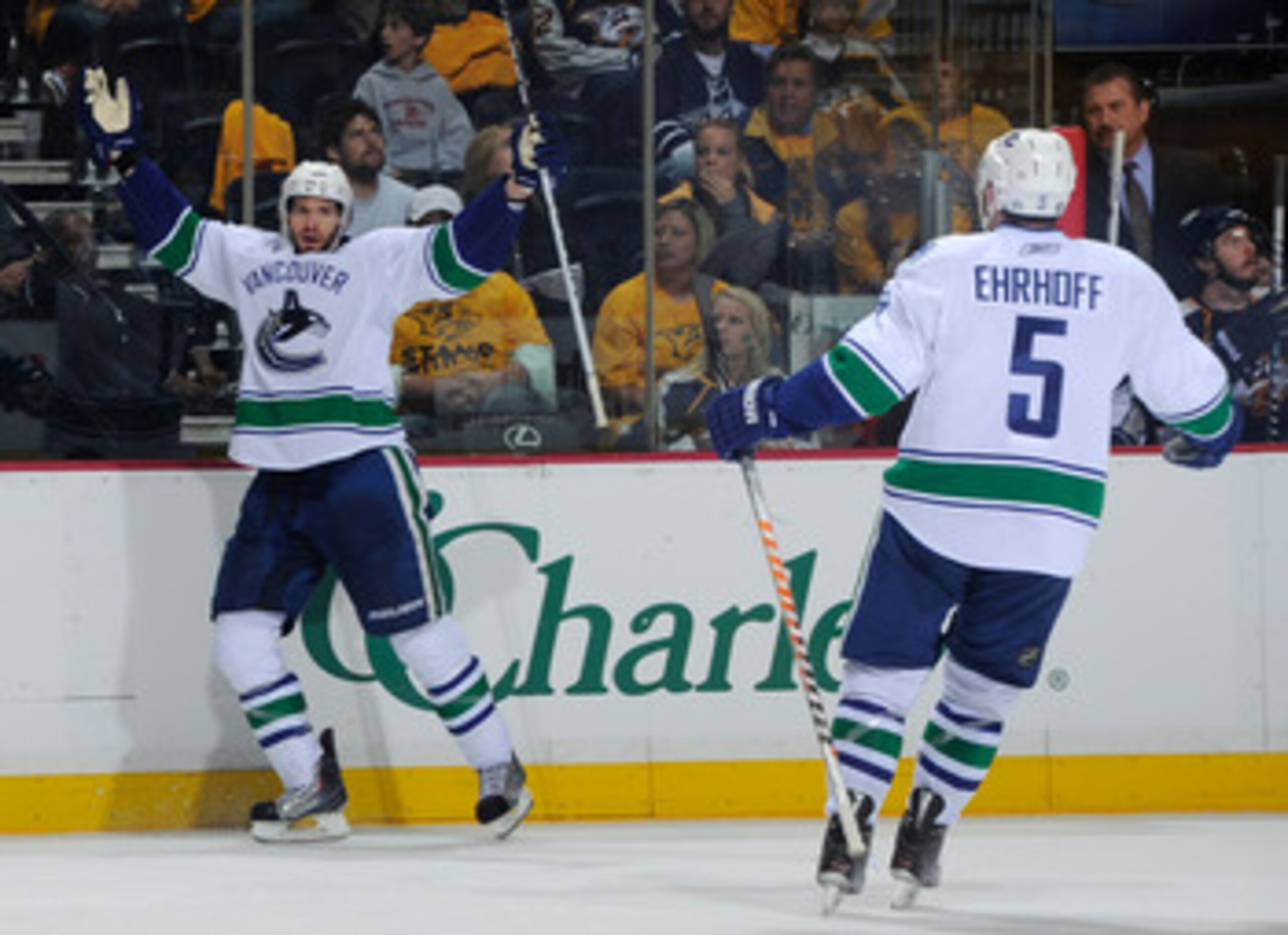 NASHVILLE, TN - MAY 05:  Ryan Kesler #17 of the Vancouver Canucks celebrates with teammate Christian Ehrhoff #5 after scoring a goal against the Nashville Predators in Game Four of the Western Conference Semifinals at Bridgestone Arena on May 5, 2011 in N