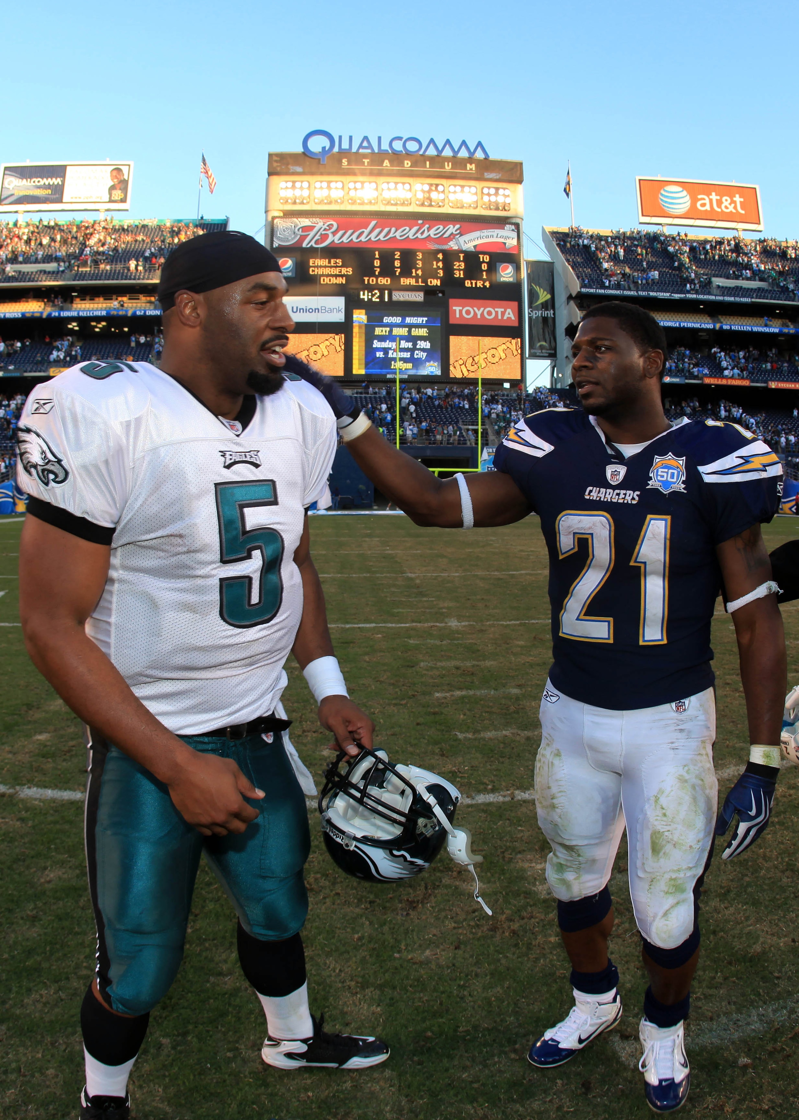 SAN DIEGO, CA - NOVEMBER 15:  Runningback LaDainian Tomlinson #21 of the San Diego Chargers meets Quarterback Donavan McNabb #5 of the Philadelphia Eagles on the field at the end of the NFL football game on November 15, 2009 at Qualcomm Stadium in San Die