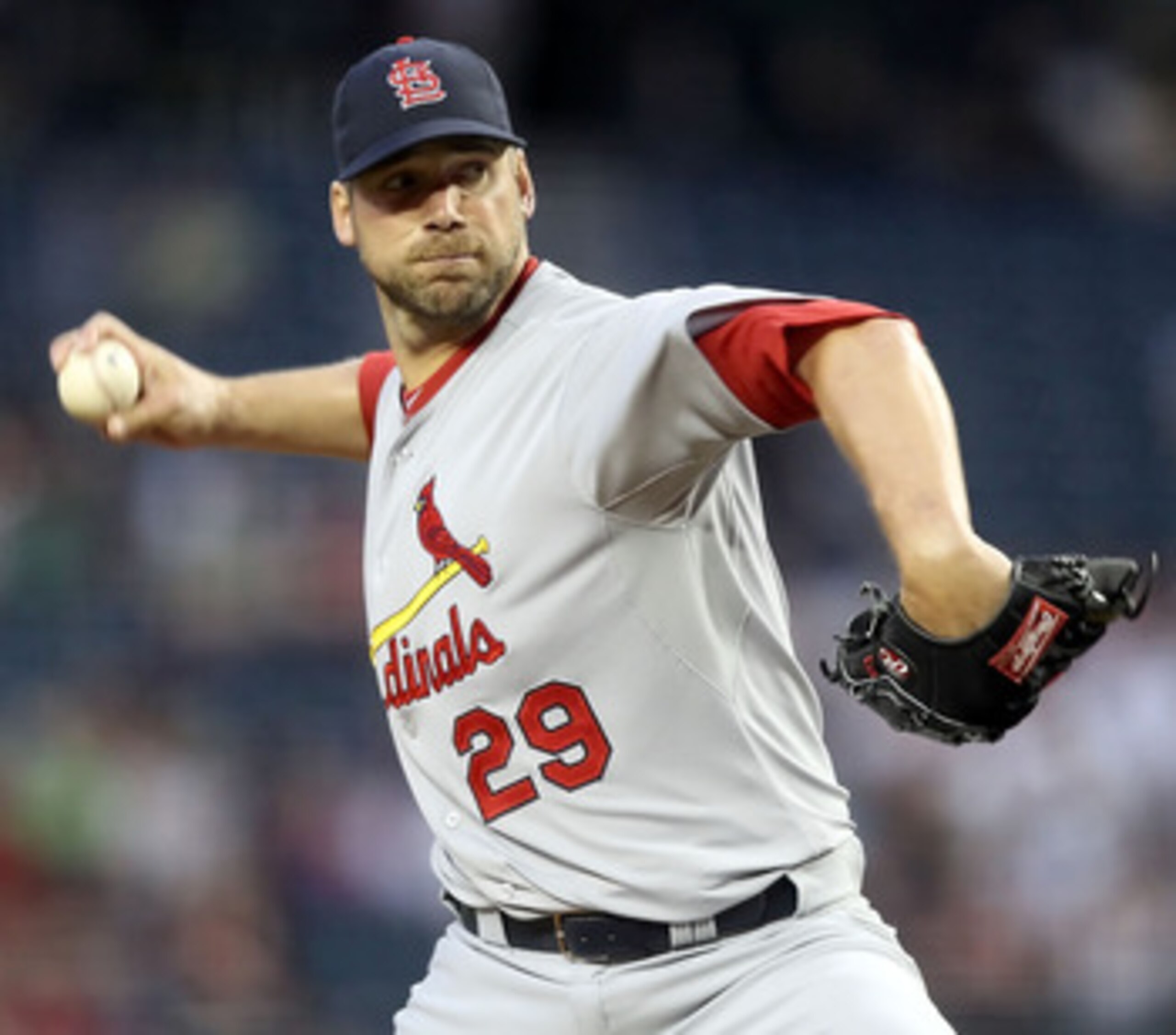 PHOENIX, AZ - APRIL 12:  Starting pitcher Chris Carpenter #29 of the St. Louis Cardinals pitches against the Arizona Diamondbacks during the Major League Baseball game at Chase Field on April 12, 2011 in Phoenix, Arizona. The Diamondbacks defeated the Car