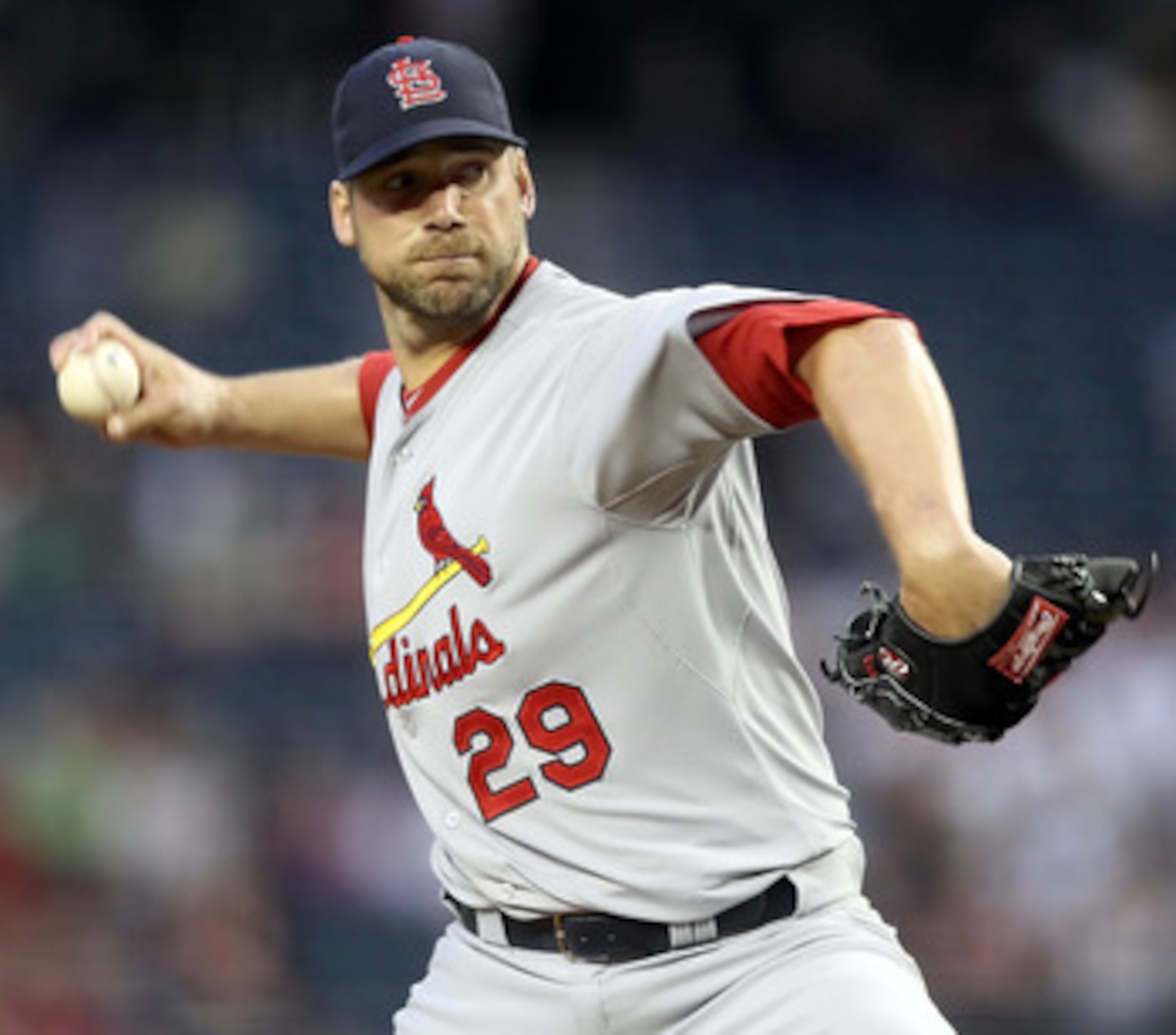 PHOENIX, AZ - APRIL 12:  Starting pitcher Chris Carpenter #29 of the St. Louis Cardinals pitches against the Arizona Diamondbacks during the Major League Baseball game at Chase Field on April 12, 2011 in Phoenix, Arizona. The Diamondbacks defeated the Car