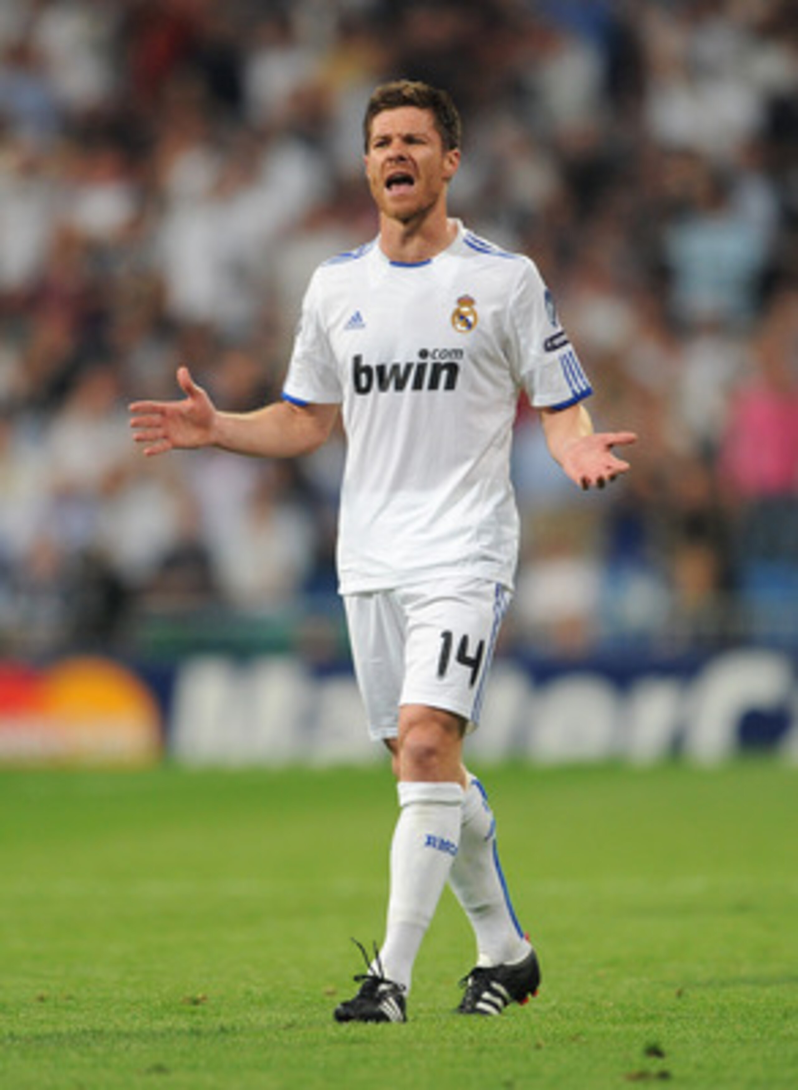 MADRID, SPAIN - APRIL 27: Xabi Alonso of Real Madrid reacts during the UEFA Champions League Semi Final first leg match between Real Madrid and Barcelona at the Estadio Santiago Bernabeu on April 27, 2011 in Madrid, Spain. (Photo by Jasper Juinen/Getty MADRID, SPAIN - APRIL 27: Xabi Alonso of Real Madrid reacts during the UEFA Champions League Semi Final first leg match between Real Madrid and Barcelona at the Estadio Santiago Bernabeu on April 27, 2011 in Madrid, Spain. (Photo by Jasper Juinen/Getty