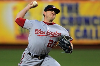 NEW YORK, NY - APRIL 08:  Drew Storen #22 of the Washington Nationals throws a pitch against the New York Mets during the Mets' Home Opener at Citi Field on April 8, 2011 in the Flushing neighborhood of Queens in New York City. The Nationals won 6-2.  (Ph