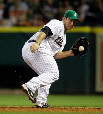 HOUSTON - APRIL 26:  First baseman Brett Wallace #29 of the Houston Astros fields a ground ball against the St. Louis Cardinals at Minute Maid Park on April 26, 2011 in Houston, Texas.  (Photo by Bob Levey/Getty Images)