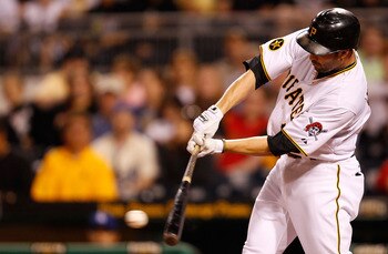 PITTSBURGH - MAY 09:  Neil Walker #18 of the Pittsburgh Pirates hits an RBI double in the 8th inning against the Los Angeles Dodgers during the game on May 9, 2011 at PNC Park in Pittsburgh, Pennsylvania.  (Photo by Jared Wickerham/Getty Images)