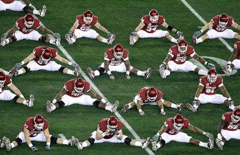 COLUMBUS, OH - SEPTEMBER 11:  Ross Homan #51 of the Ohio State Buckeyes tackles Leonard Hankerson #85 of the Miami Hurricanes at Ohio Stadium on September 11, 2010 in Columbus, Ohio.  (Photo by Jamie Sabau/Getty Images)