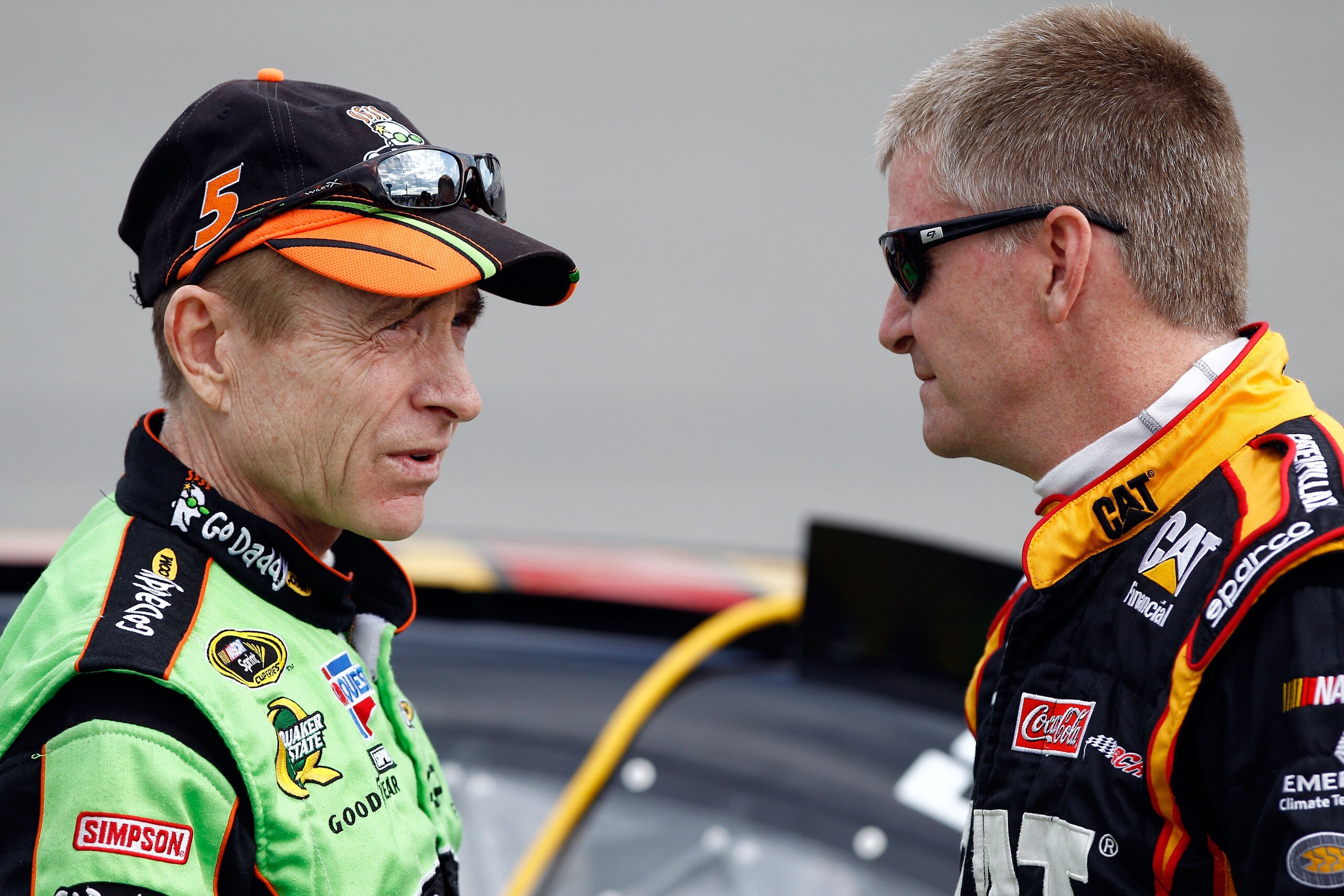 RICHMOND, VA - APRIL 29: Jeff Burton, driver of the #31 Caterpillar Chevrolet, speaks with Mark Martin, driver of the #5 GoDaddy.com Chevrolet, during qualifying for the NASCAR Sprint Cup Series Crown Royal Presents The Matthew & Daniel Hansen 400 at Ric RICHMOND, VA - APRIL 29: Jeff Burton, driver of the #31 Caterpillar Chevrolet, speaks with Mark Martin, driver of the #5 GoDaddy.com Chevrolet, during qualifying for the NASCAR Sprint Cup Series Crown Royal Presents The Matthew & Daniel Hansen 400 at Ric