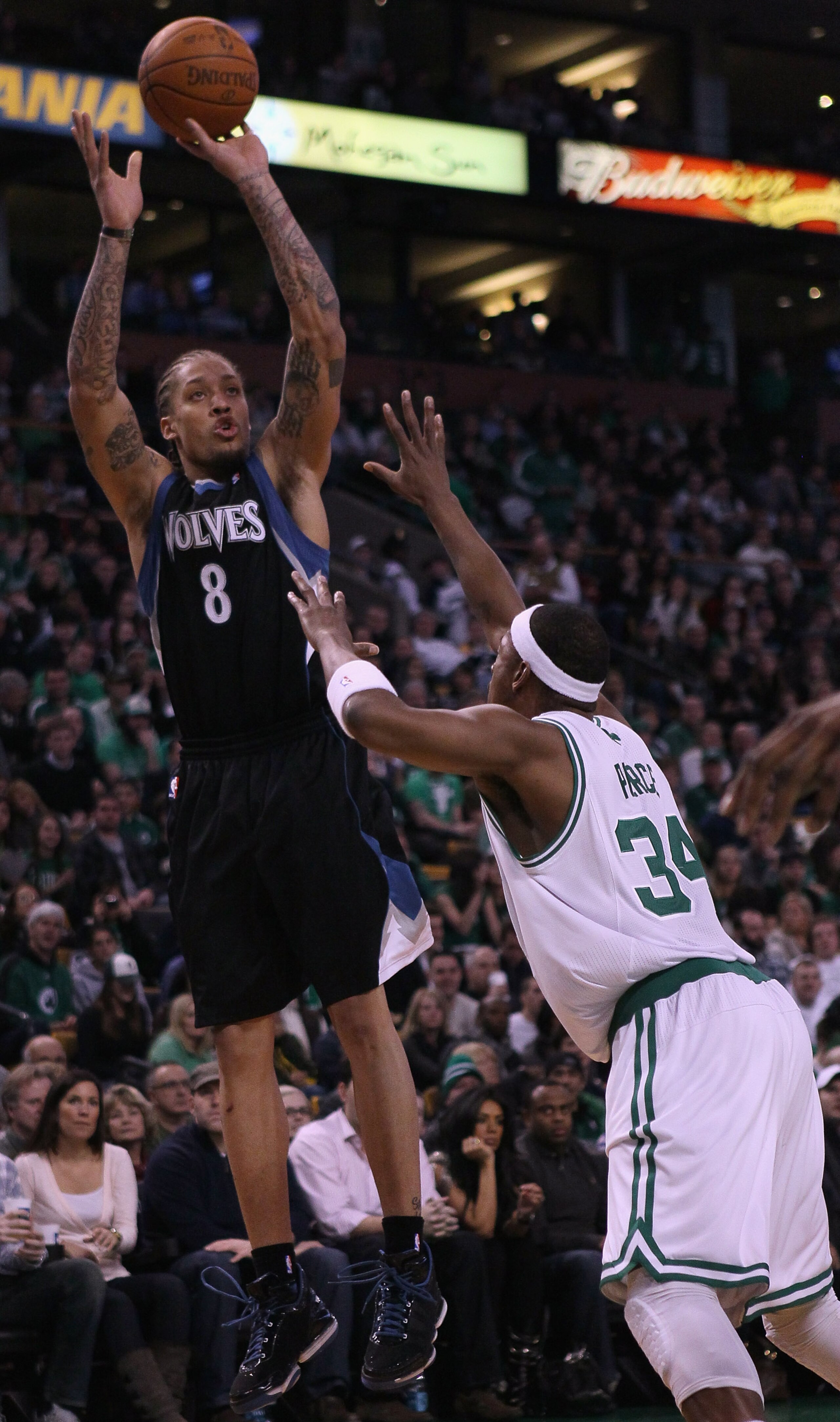 BOSTON, MA - JANUARY 03:  Michael Beasley #8 of the Minnesota Timberwolves takes a shot as Paul Pierce #34 of the Boston Celtics defends on January 3, 2011 at the TD Garden in Boston, Massachusetts. NOTE TO USER: User expressly acknowledges and agrees tha