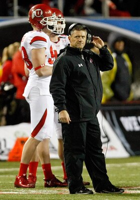 LAS VEGAS, NV - DECEMBER 22:  Head coach Kyle Whittingham of the Utah Utes stands on the field during a time-out in the MAACO Bowl Las Vegas against the Boise State Broncos at Sam Boyd Stadium December 22, 2010 in Las Vegas, Nevada. Boise State Won 26-3.