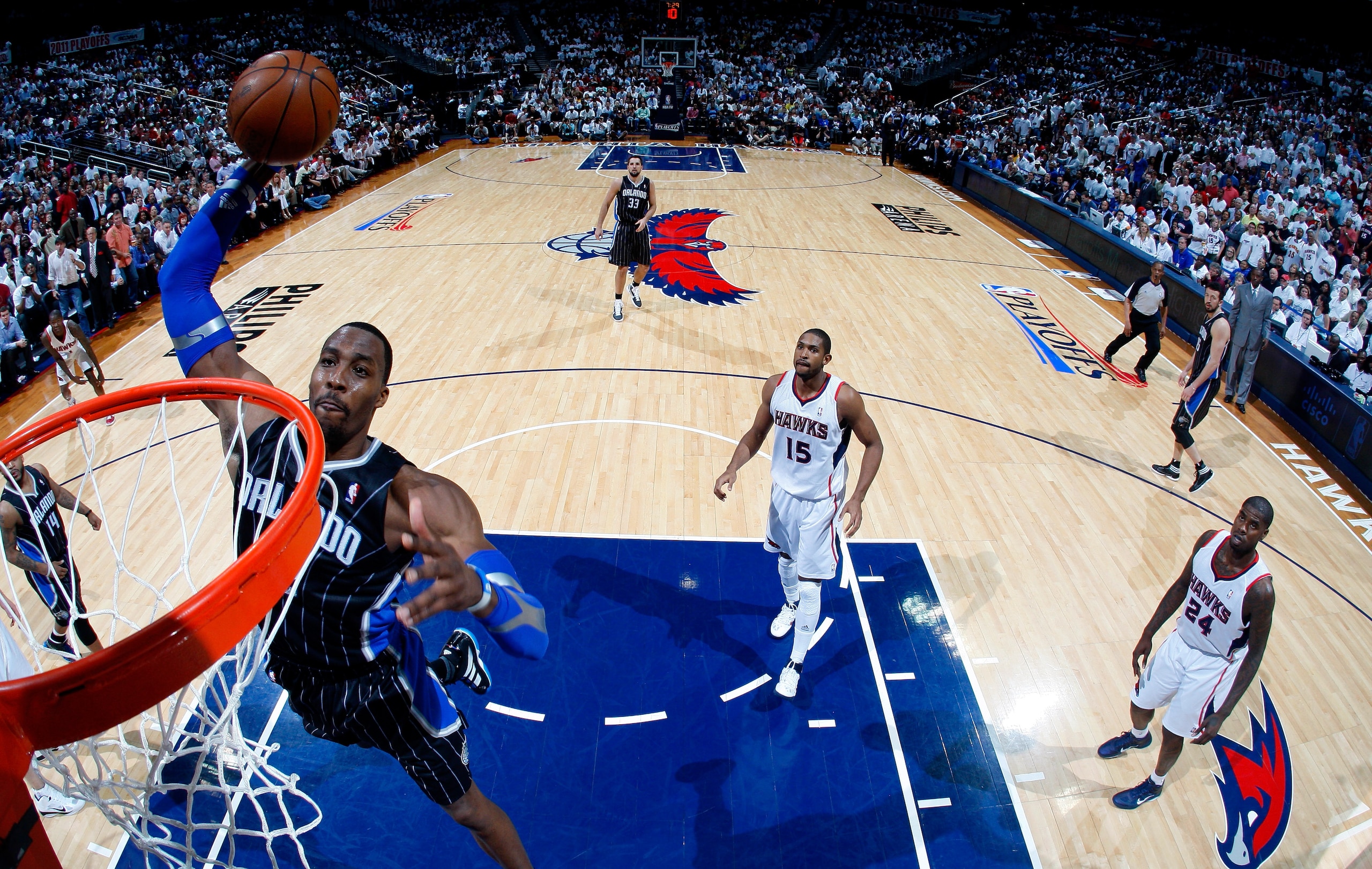 ATLANTA, GA - APRIL 28:  Dwight Howard #12 of the Orlando Magic dunks against the Atlanta Hawks during Game Six of the Eastern Conference Quarterfinals in the 2011 NBA Playoffs at Philips Arena on April 28, 2011 in Atlanta, Georgia.  NOTE TO USER: User ex