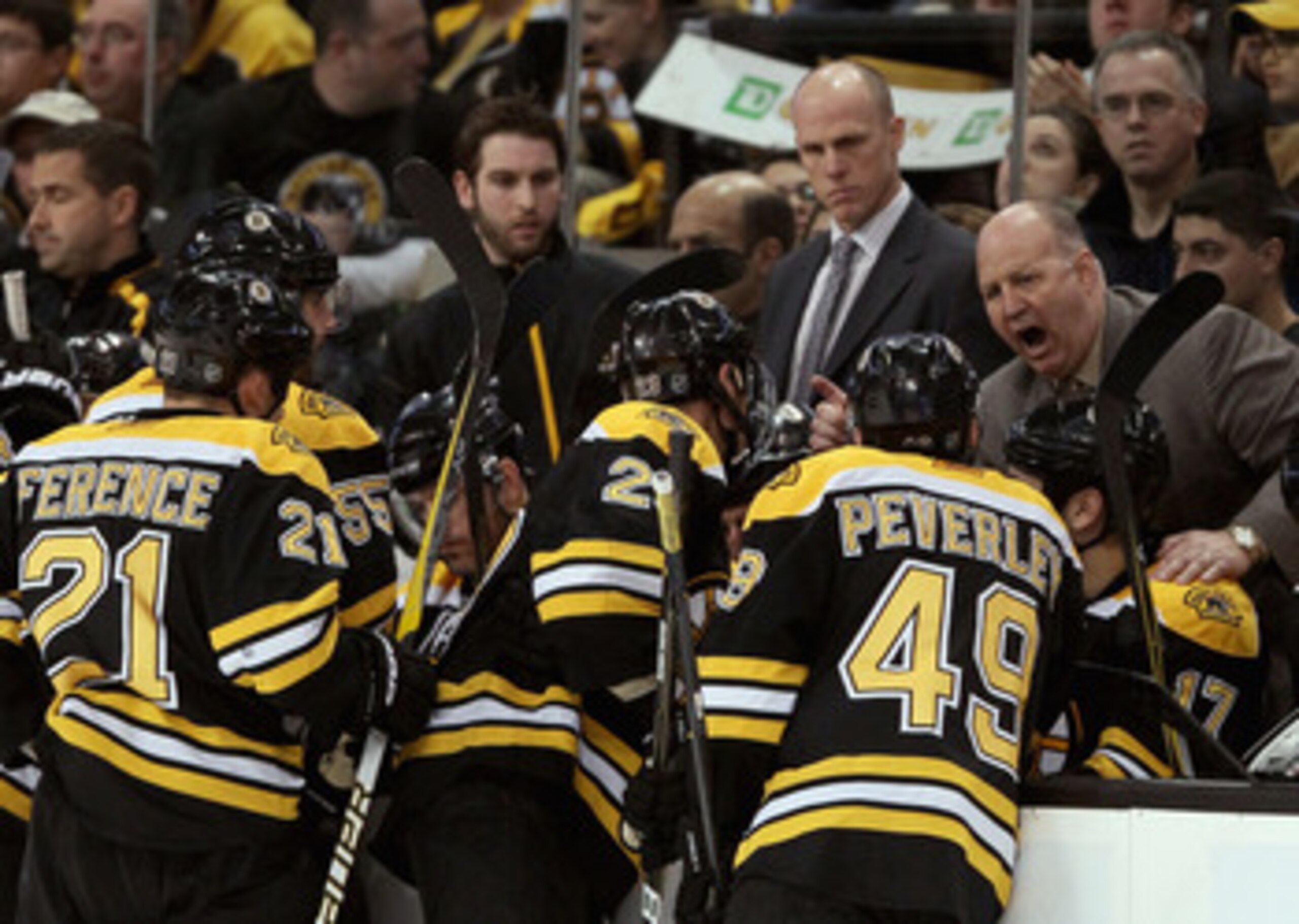 BOSTON, MA - APRIL 23:  Head coach Claude Julien of the Boston Bruins talks with his players during a time out against the Montreal Canadiens in Game Five of the Eastern Conference Quarterfinals during the 2011 NHL Stanley Cup Playoffs at TD Garden on Apr