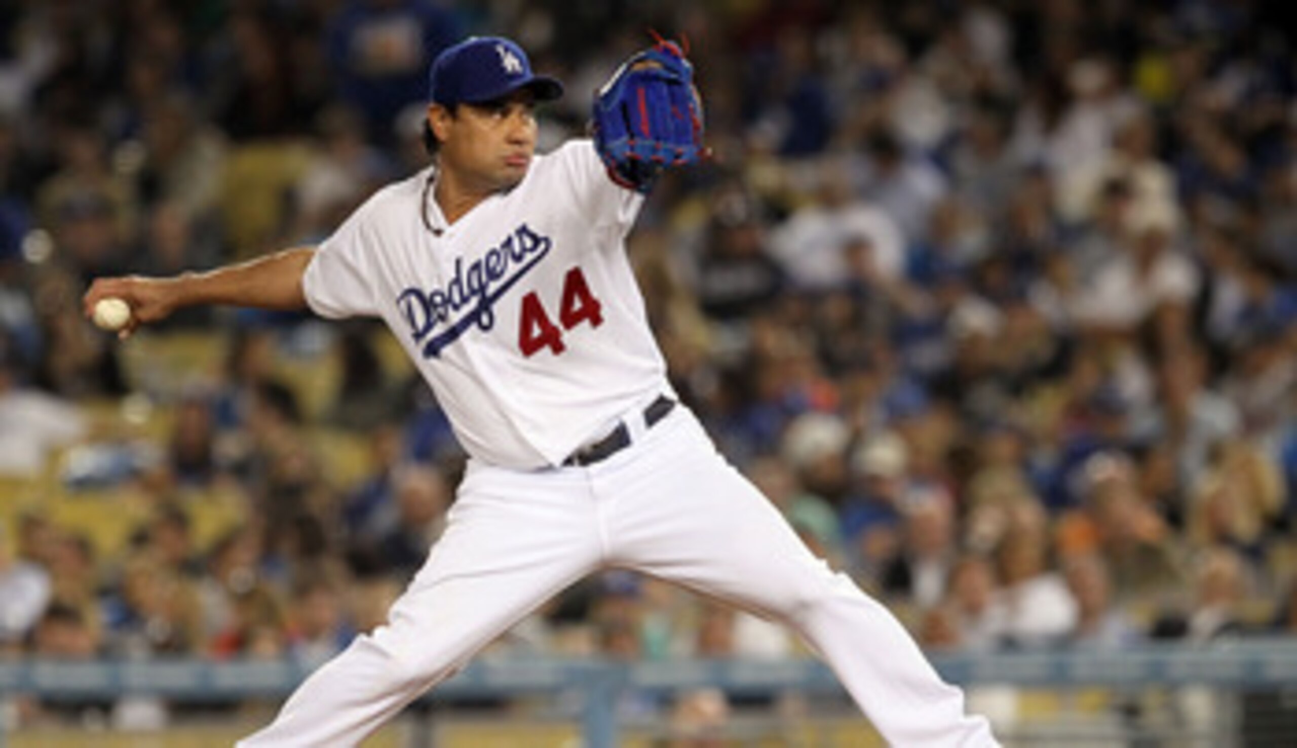 LOS ANGELES, CA - AUGUST 04:  Starting pitcher Vicente Padilla #44 of the Los Angeles Dodgers pitches against the San Diego Padres at Dodger Stadium on August 4, 2010 in Los Angeles, California. The Dodgers defeated the Padres 9-0.  (Photo by Jeff Gross/G