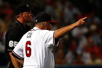 ATLANTA - AUGUST 14:  Atlanta Braves manager Bobby Cox argues with home plate umpire Ted Barrett in the fifth inning of the game against the San Francisco Giants at Turner Field August 14, 2007 in Atlanta, Georgia. Cox was ejected shortly afterwards for t