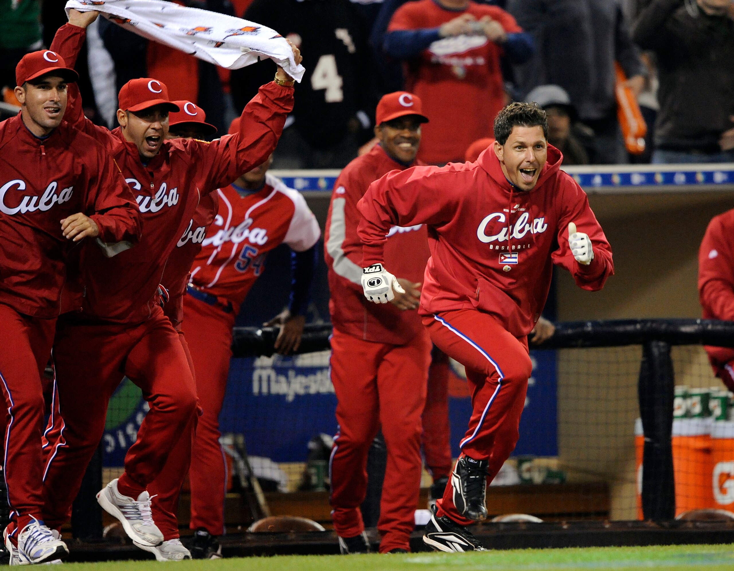 SAN DIEGO - MARCH 16: Yunesky Maya #97 of Cuba runs out to the mound after winning against Mexico during the 2009 World Baseball Classic Round 2 Pool 1 Game 3 on March 16, 2009 at Petco Park in San Diego, California. Cuba wins over Mexico 7-4. (Photo by K