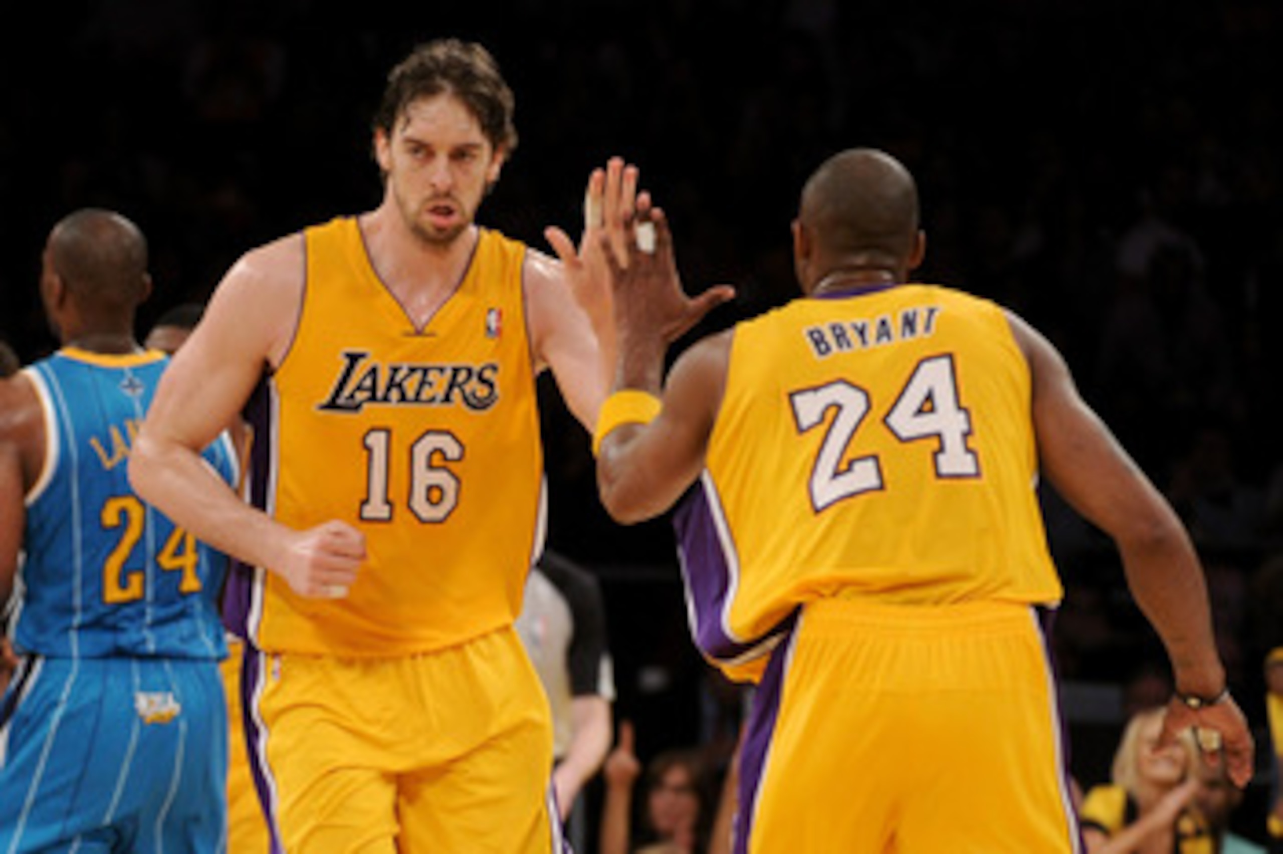LOS ANGELES, CA - APRIL 26:  Pau Gasol #16 reacts with teammate Kobe Bryant #24 of the Los Angeles Lakers in the third quarter while taking on the New Orleans Hornets in Game Five of the Western Conference Quarterfinals in the 2011 NBA Playoffs on April 2