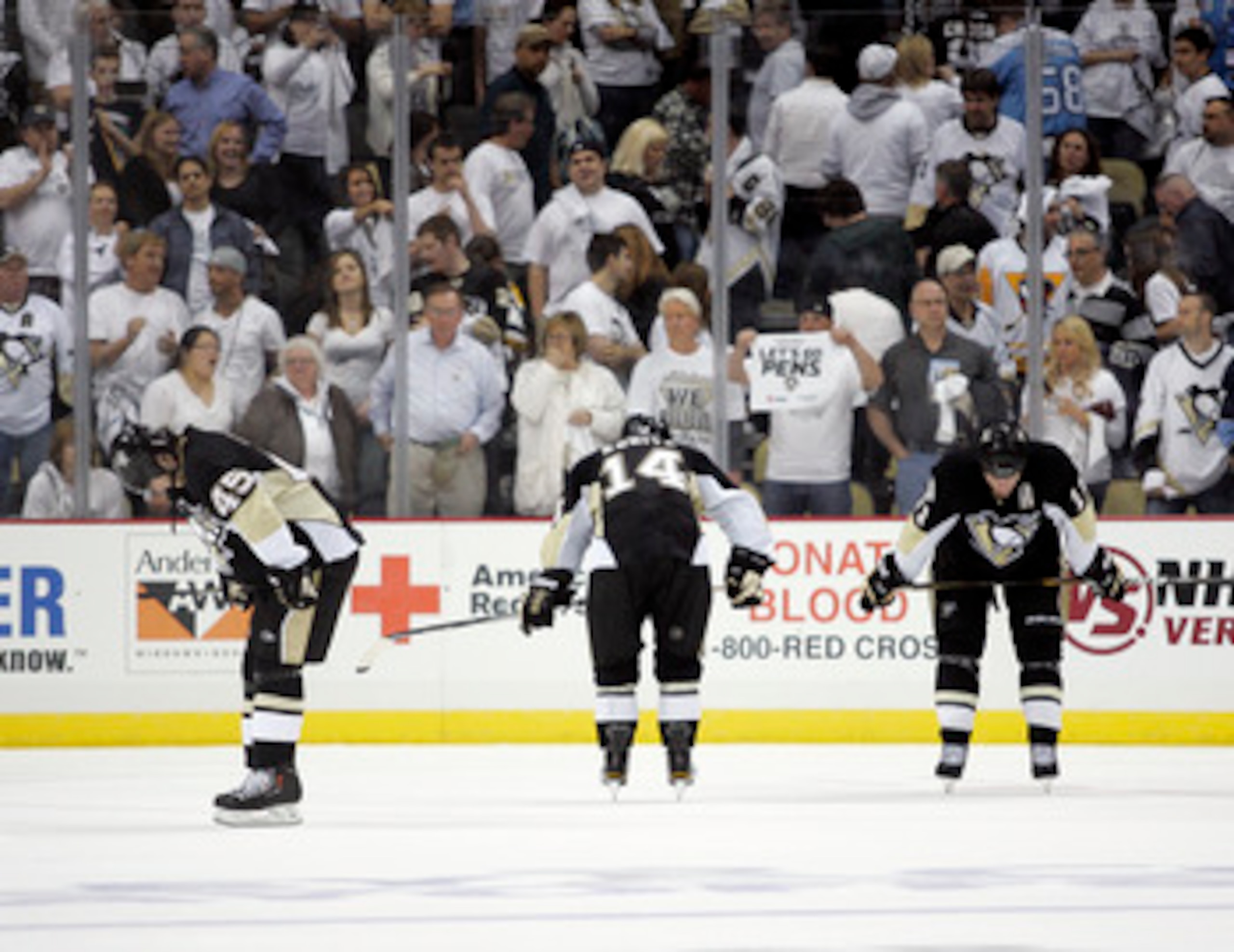 PITTSBURGH, PA - APRIL 27:  Arron Asham #45, Chris Kunitz #14 and Jordan Staal #11 of the Pittsburgh Penguins react after losing to the Tampa Bay Lightning in Game Seven of the Eastern Conference Quarterfinals during the 2011 NHL Stanley Cup Playoffs at C