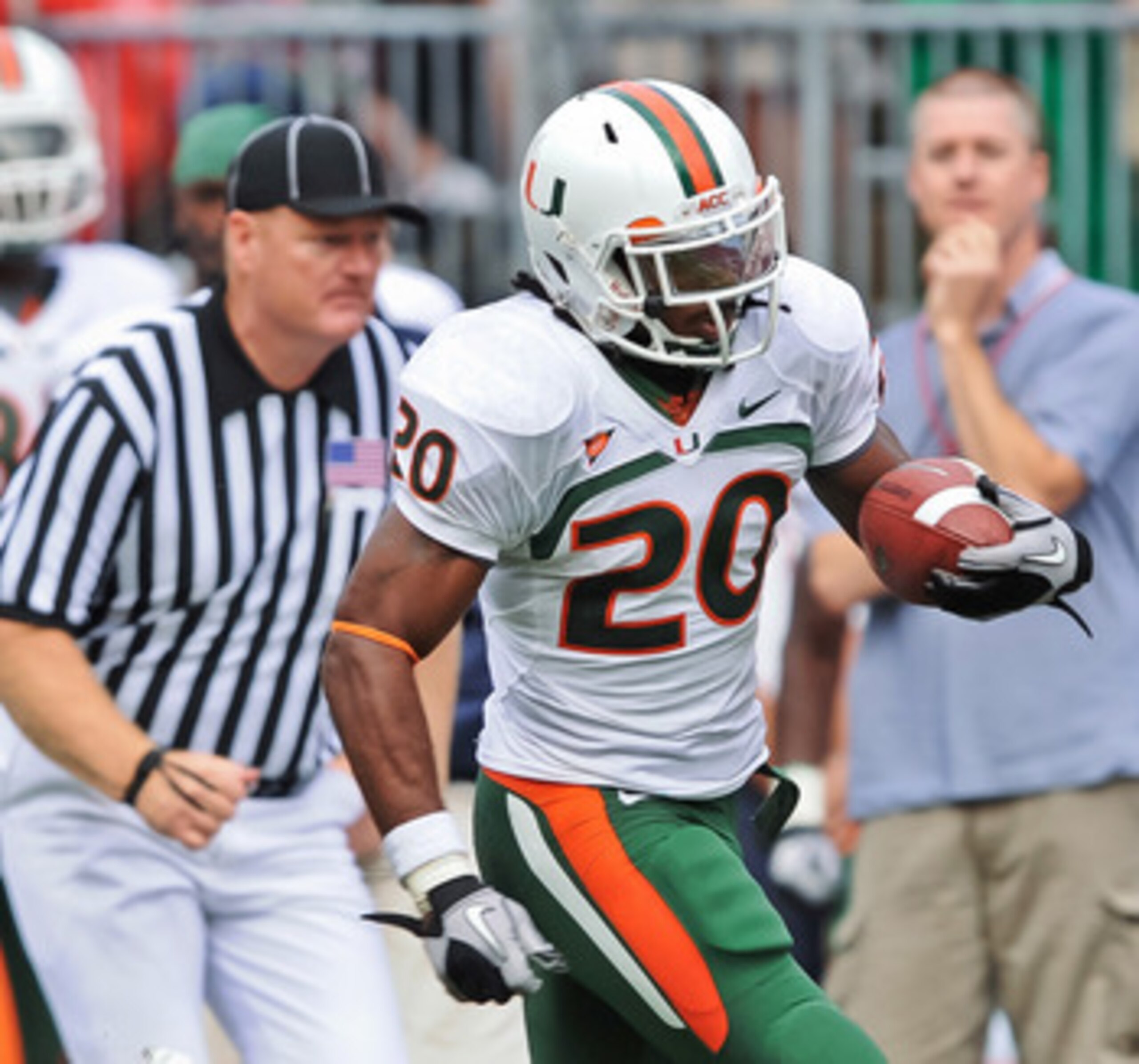 COLUMBUS, OH - SEPTEMBER 11:  Damien Berry #20 of the Miami Hurricanes runs with the ball against the Ohio State Buckeyes at Ohio Stadium on September 11, 2010 in Columbus, Ohio.  (Photo by Jamie Sabau/Getty Images)