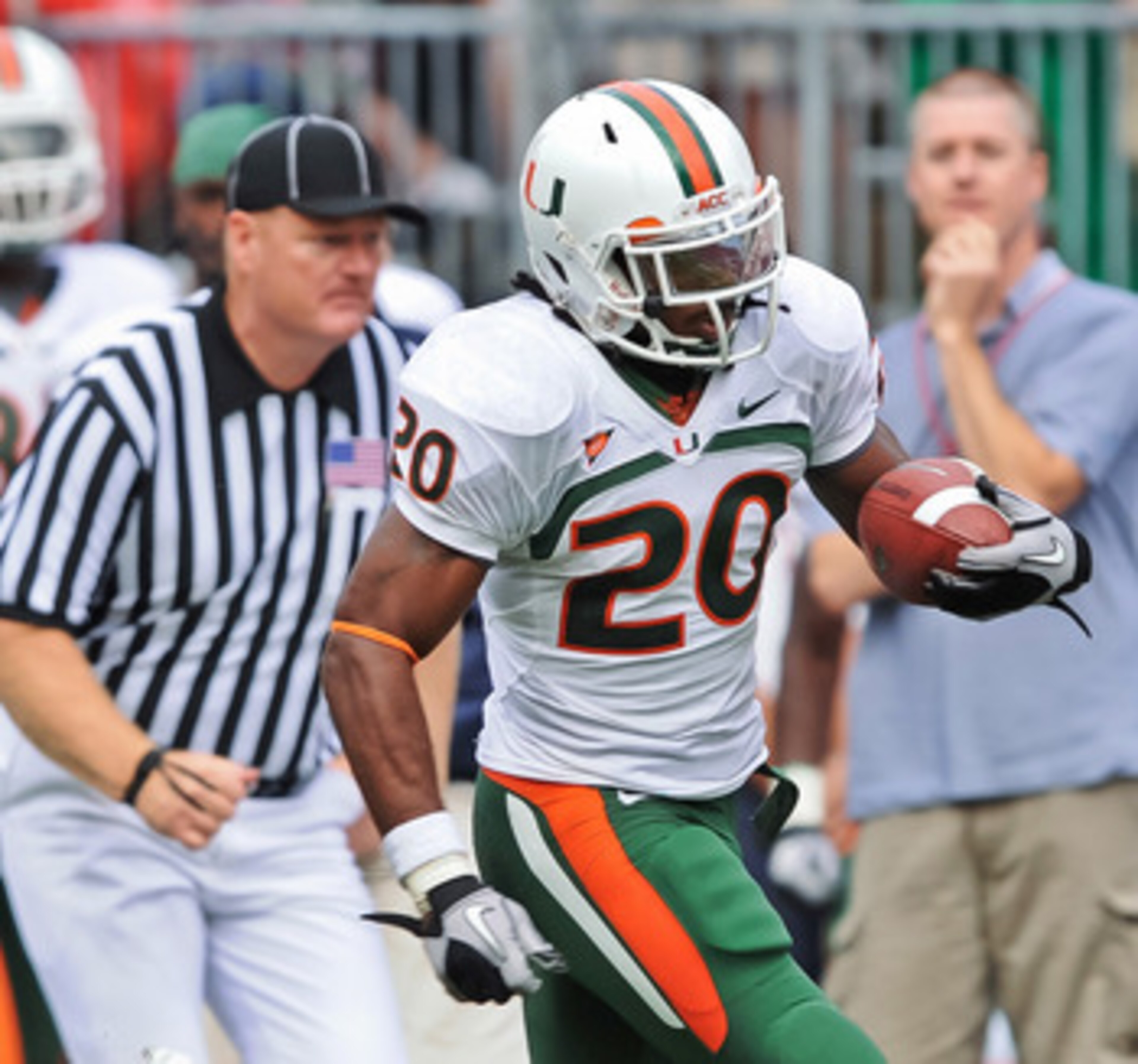 COLUMBUS, OH - SEPTEMBER 11:  Damien Berry #20 of the Miami Hurricanes runs with the ball against the Ohio State Buckeyes at Ohio Stadium on September 11, 2010 in Columbus, Ohio.  (Photo by Jamie Sabau/Getty Images)