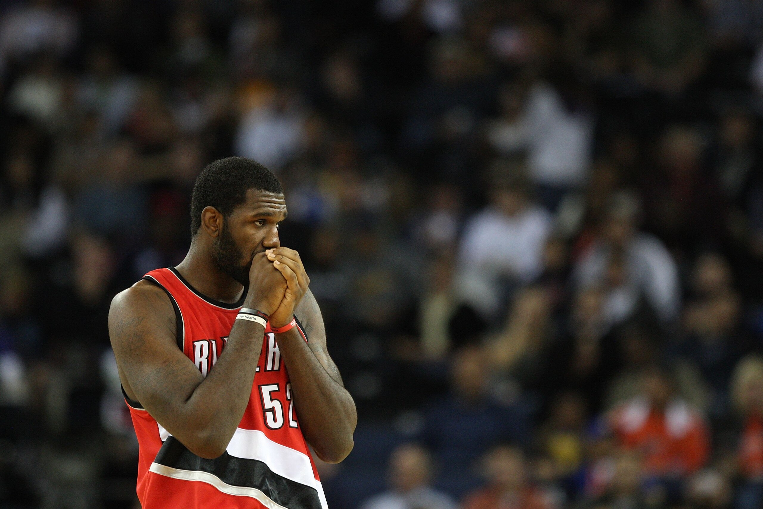 OAKLAND, CA - NOVEMBER 20:  Greg Oden #52 of the Portland Trail Blazers looks on against the Golden State Warriors during an NBA game at Oracle Arena on November 20, 2009 in Oakland, California.  (Photo by Jed Jacobsohn/Getty Images)