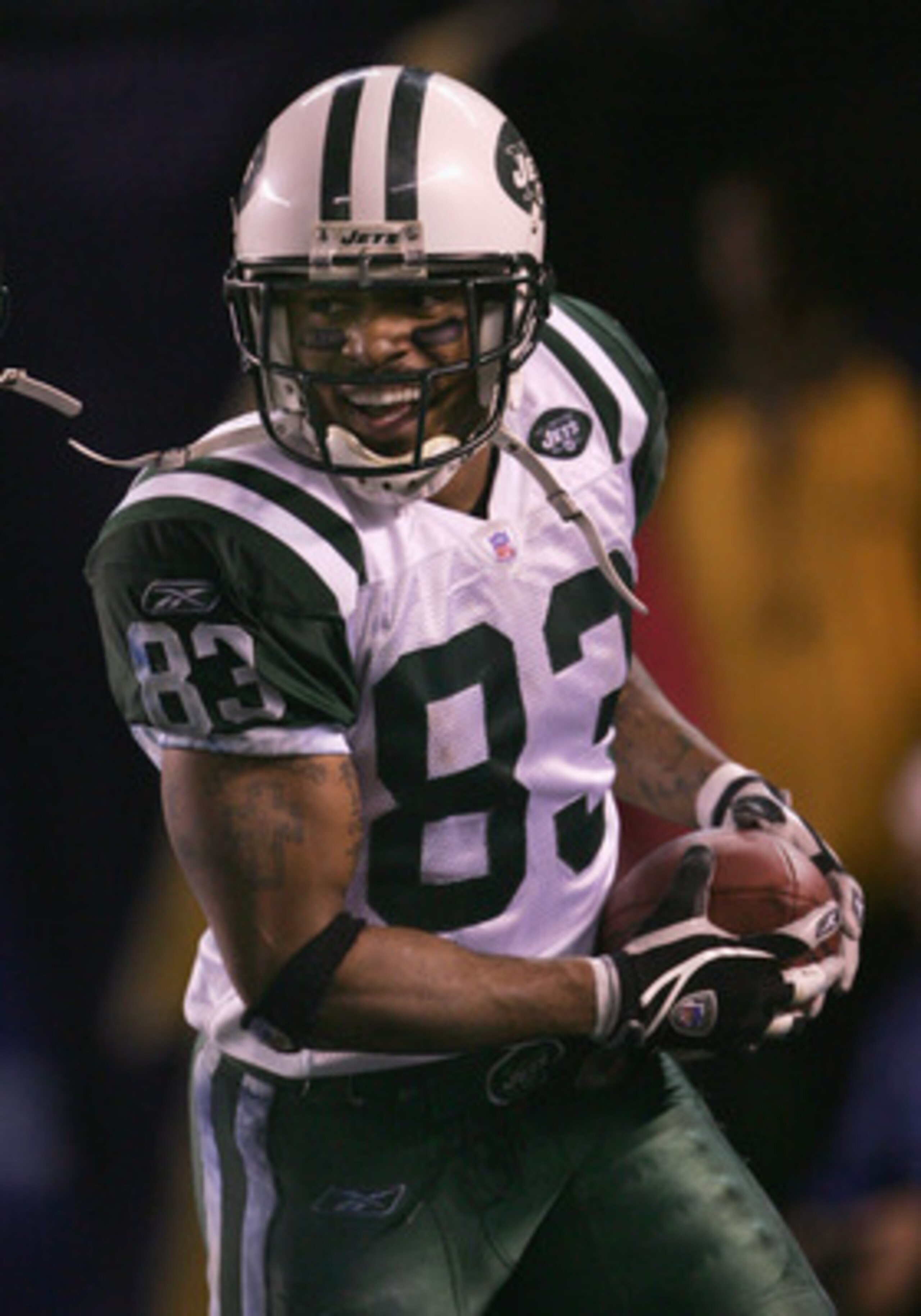 SAN DIEGO - JANUARY 08:  Runningback Santana Moss #83 of the New York Jets celebrates after scoring against the San Diego Chargers during the AFC wild-card game at Qualcomm Stadium on January 8, 2005 in San Diego, California.   (Photo by Stephen Dunn/Gett
